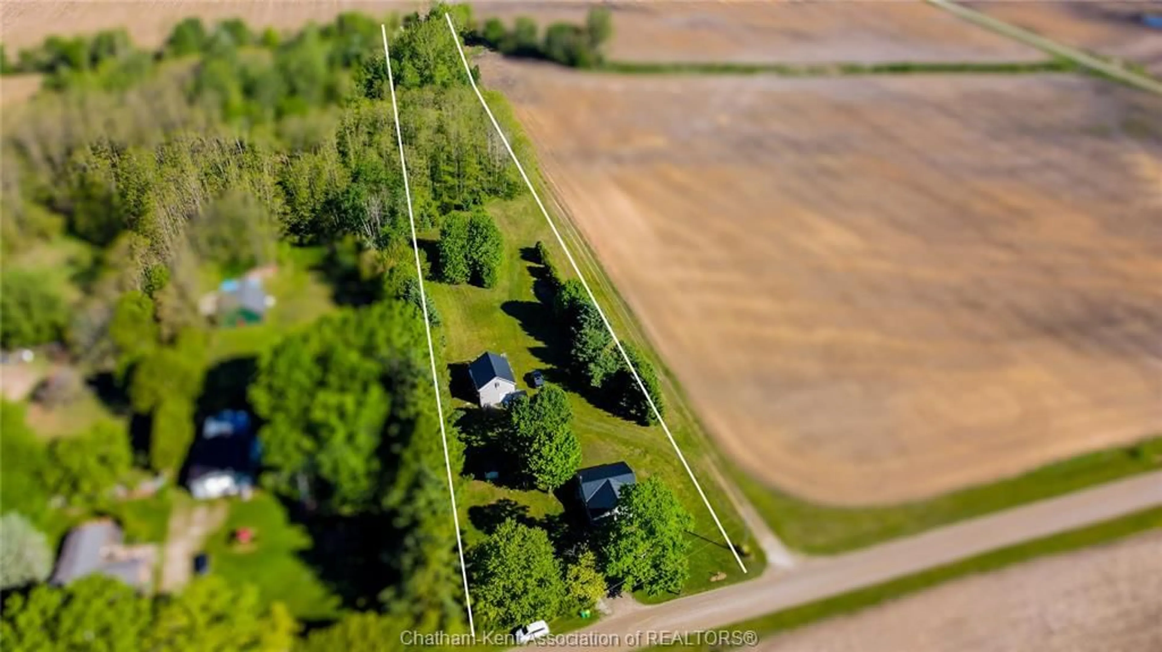 A pic from outside/outdoor area/front of a property/back of a property/a pic from drone, unknown for 1244 COLTSFOOT Dr, Newbury Ontario N0L 1Z0