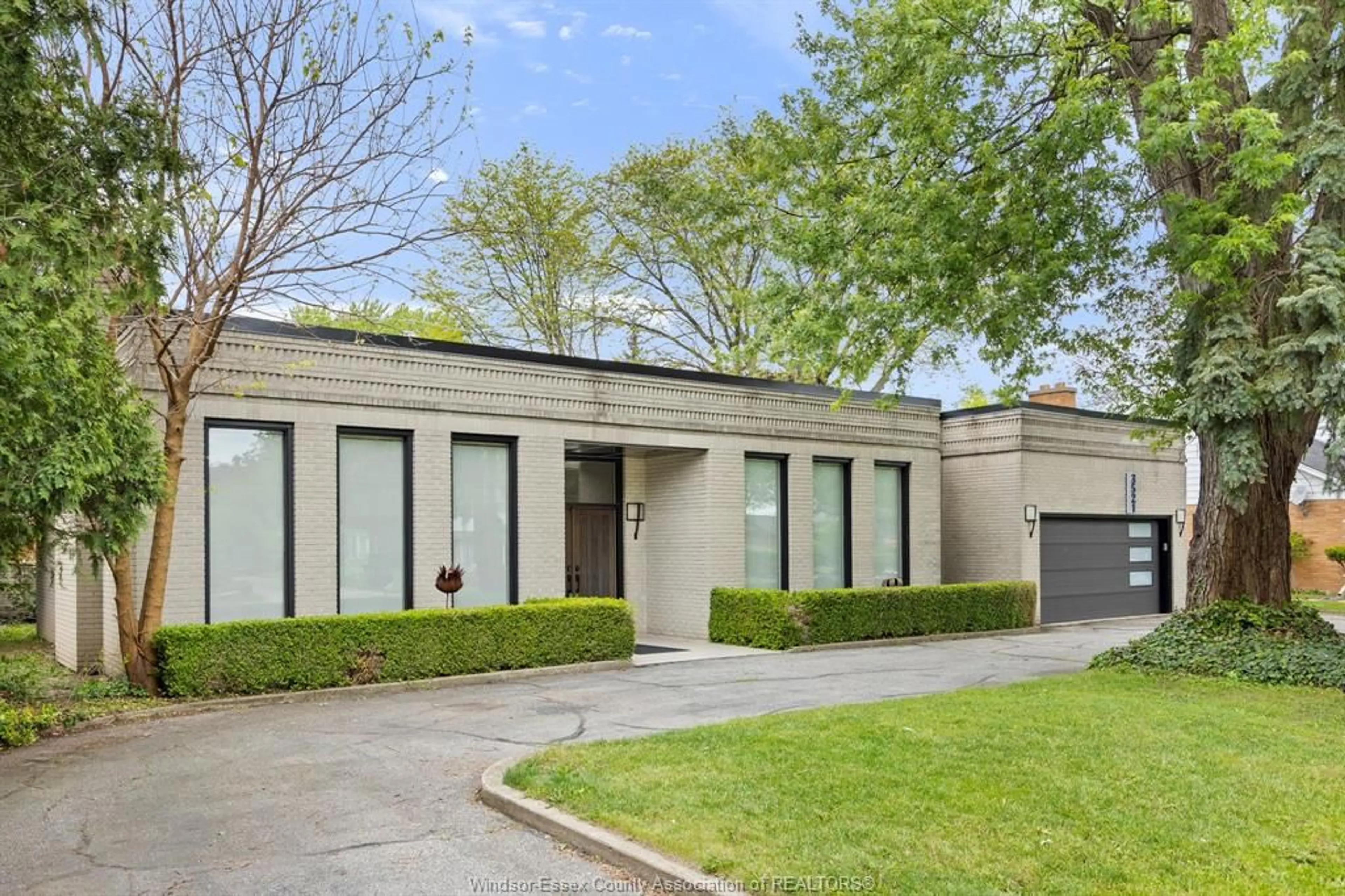 Home with brick exterior material, street for 3521 OUELLETTE, Windsor Ontario N9E 3M3