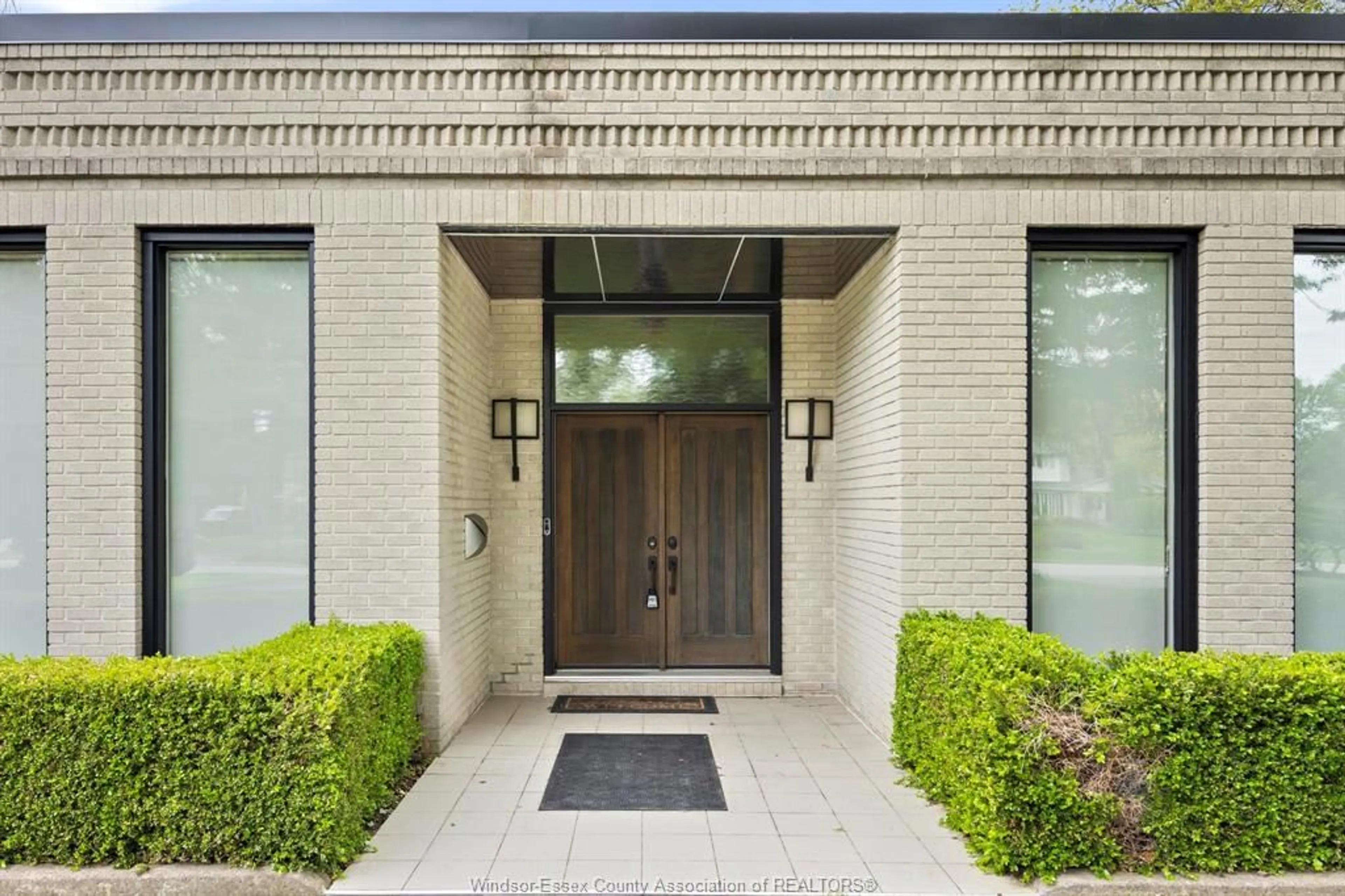 Home with brick exterior material, street for 3521 OUELLETTE, Windsor Ontario N9E 3M3