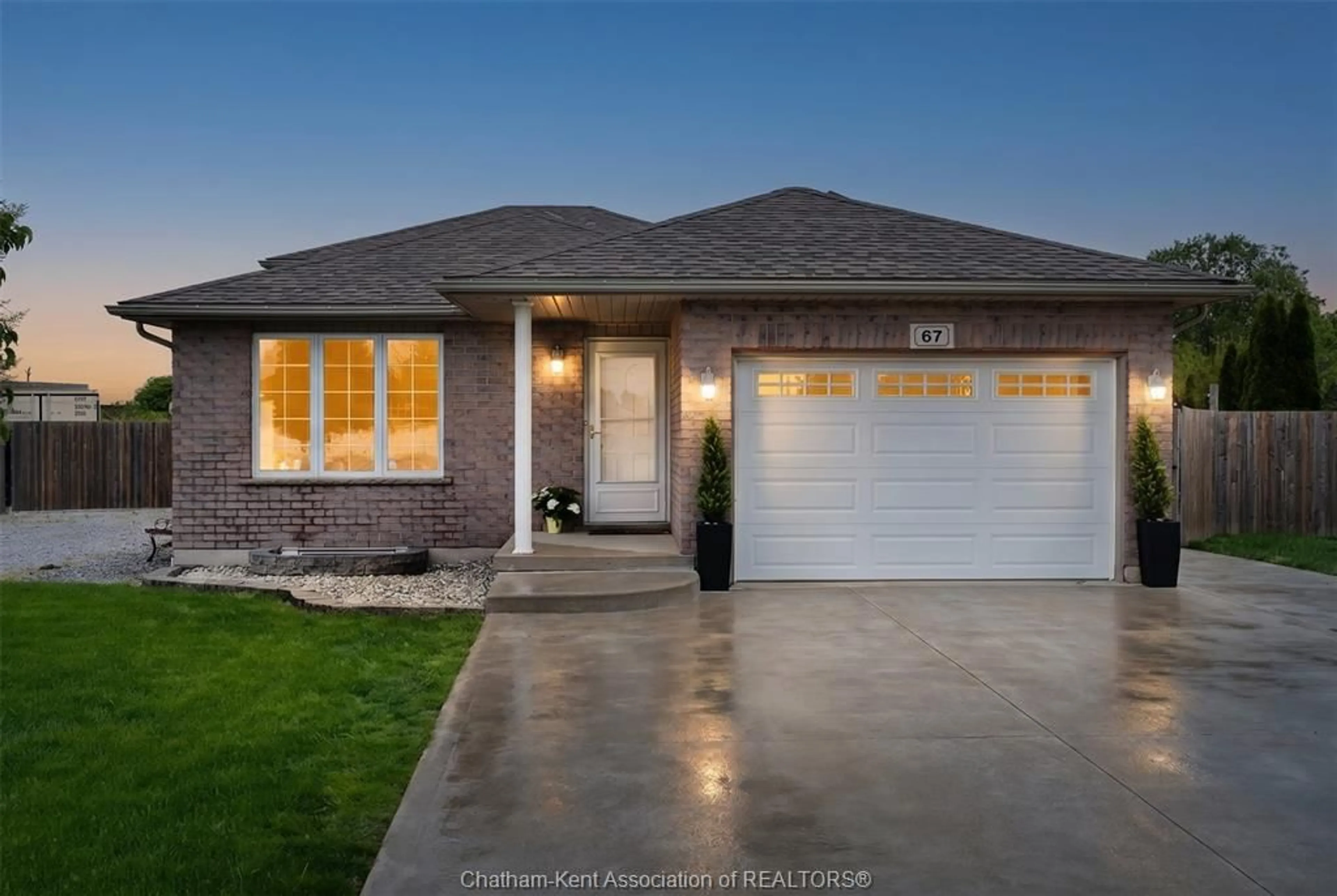 Home with brick exterior material, street for 67 Azar Ave, Tilbury Ontario N0P 2L0