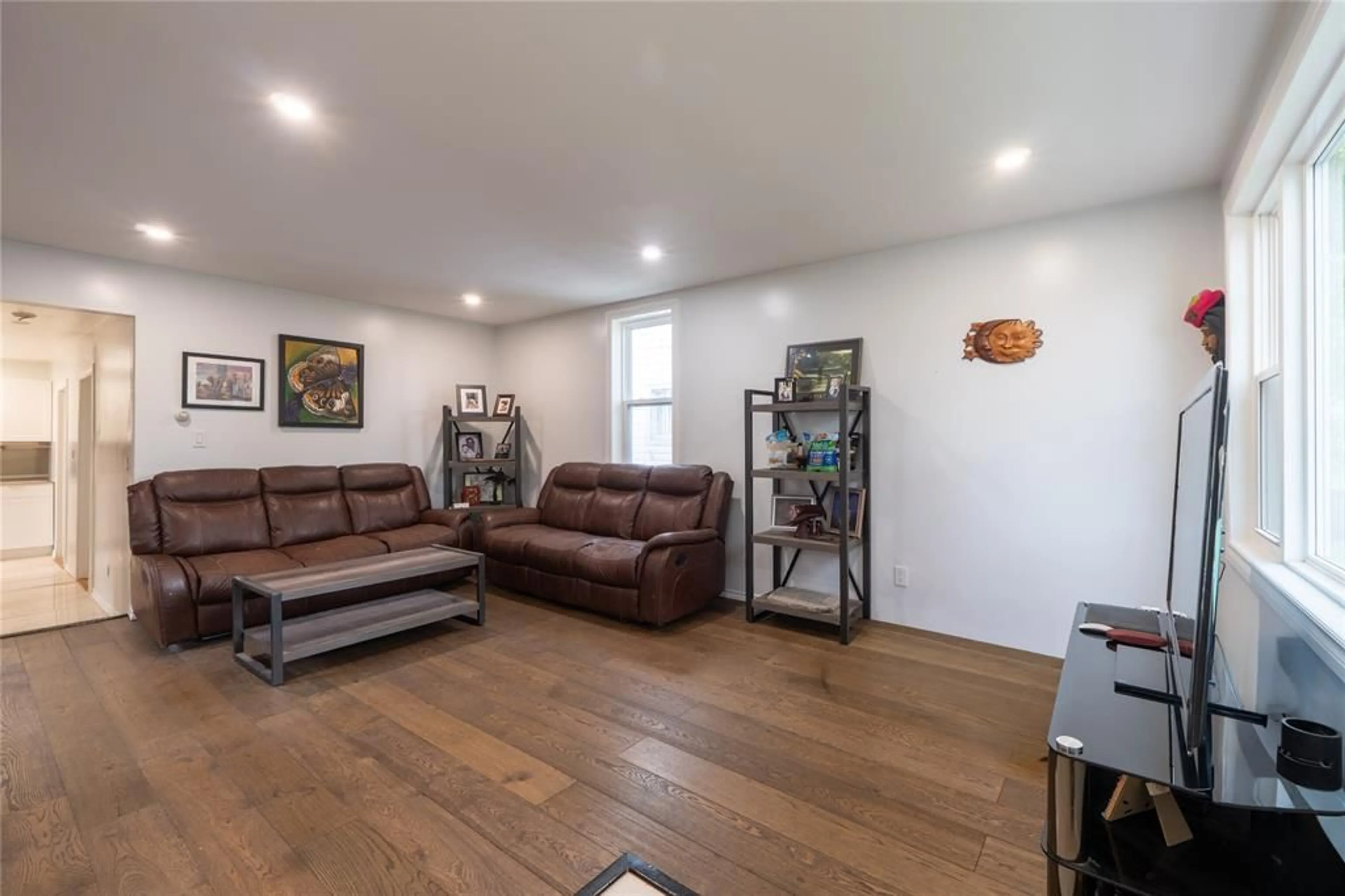 Living room with furniture, wood/laminate floor for 278 Bright St, Sarnia Ontario N7T 4G1