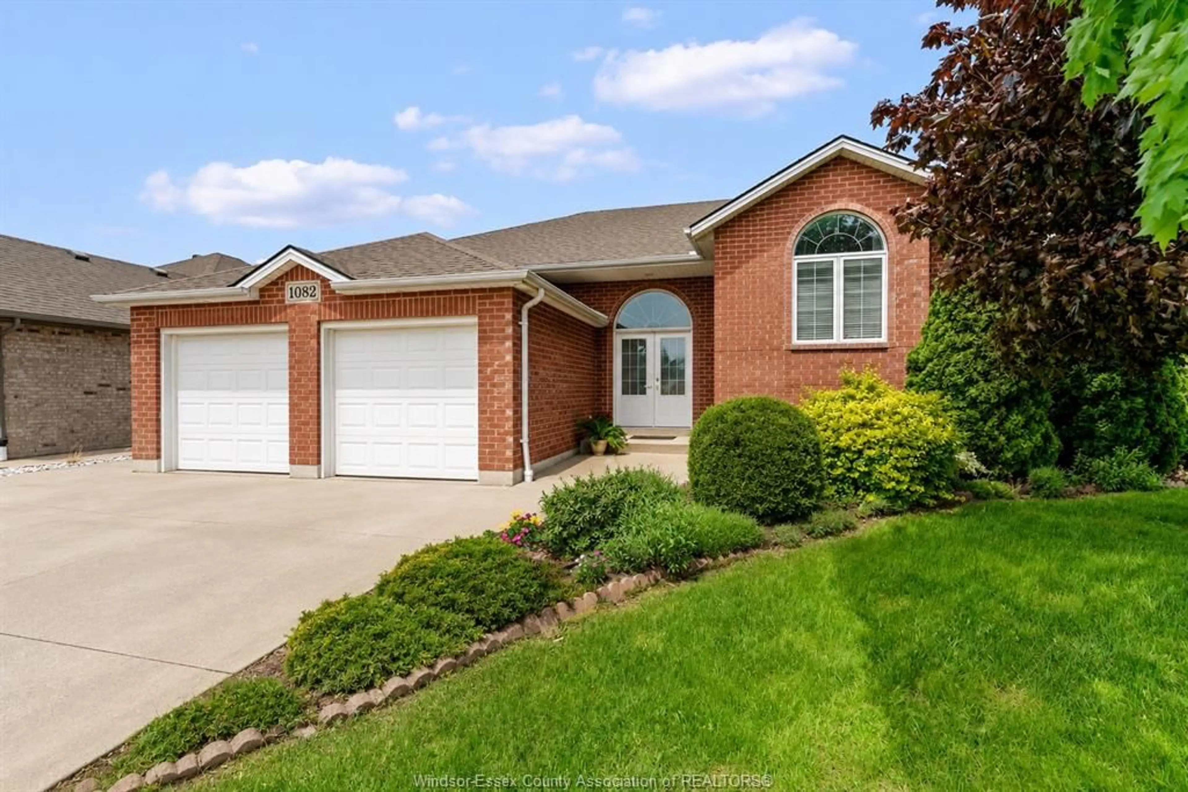 Home with brick exterior material, street for 1082 MONARCH MEADOWS, Lakeshore Ontario N0R 1A0