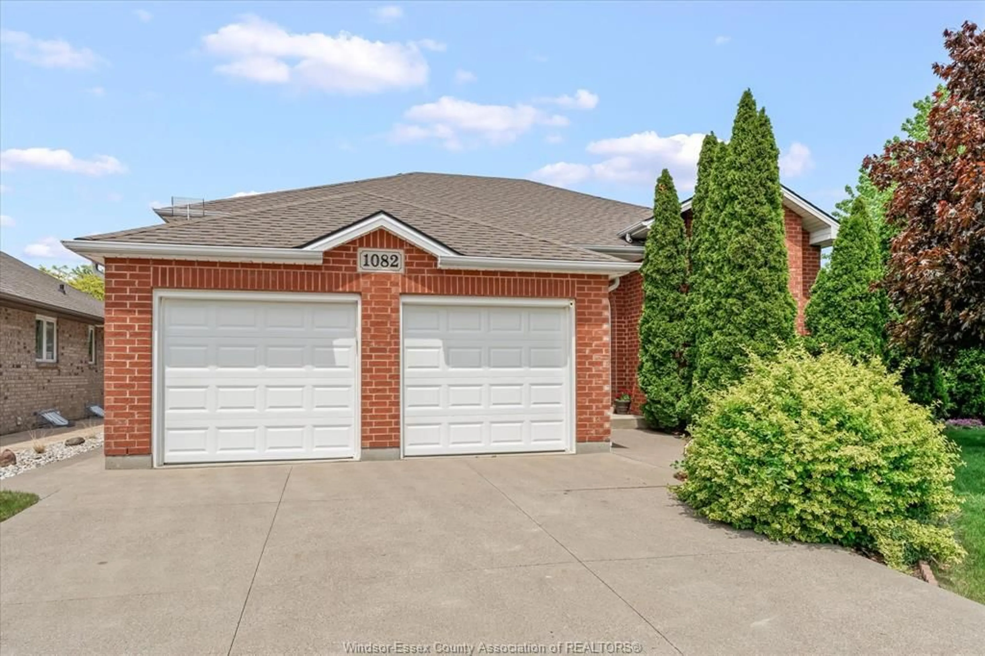 Home with brick exterior material, street for 1082 MONARCH MEADOWS, Lakeshore Ontario N0R 1A0