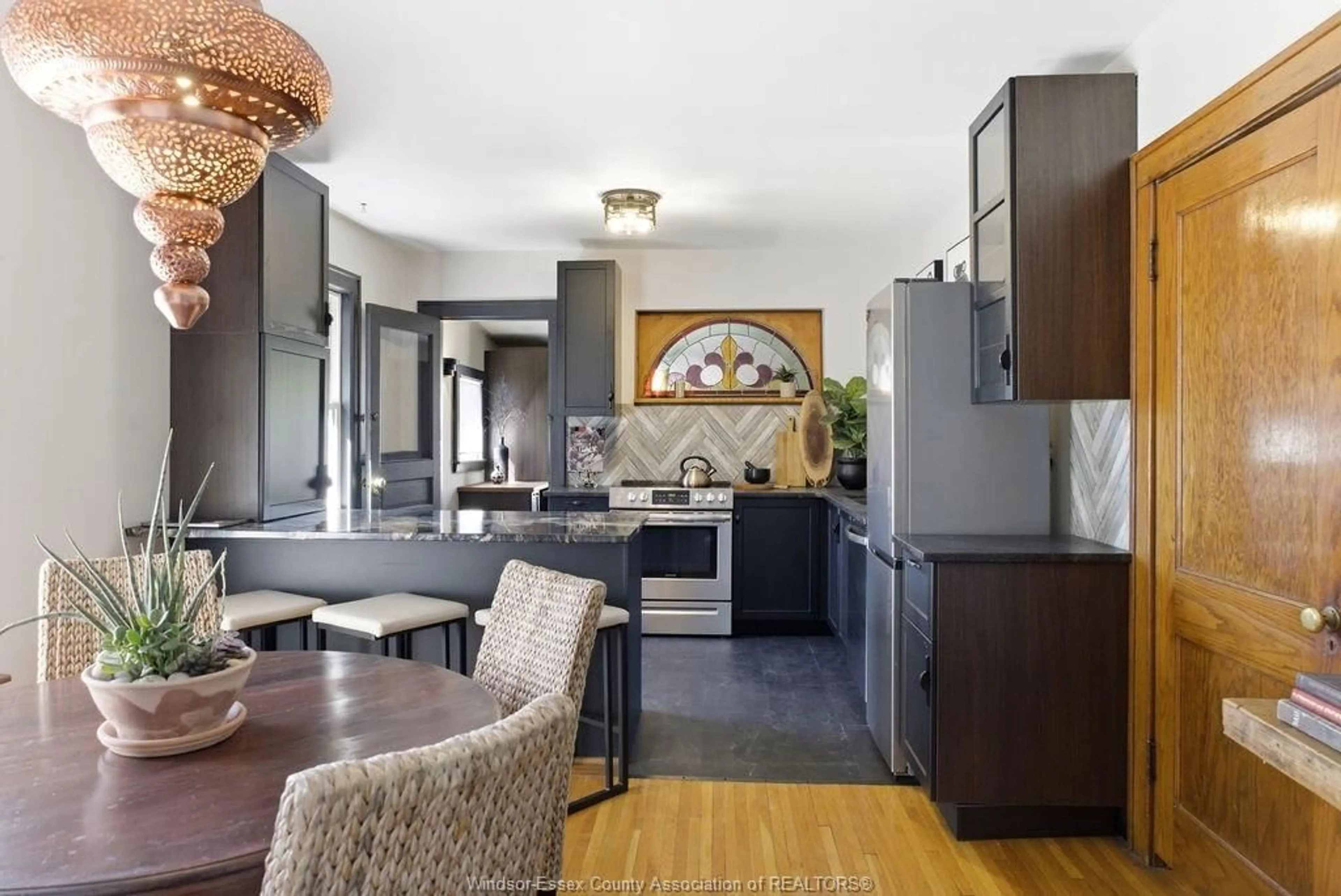 Open concept kitchen, ceramic/tile floor for 557 MOY AVE, Windsor Ontario N9A 2N3