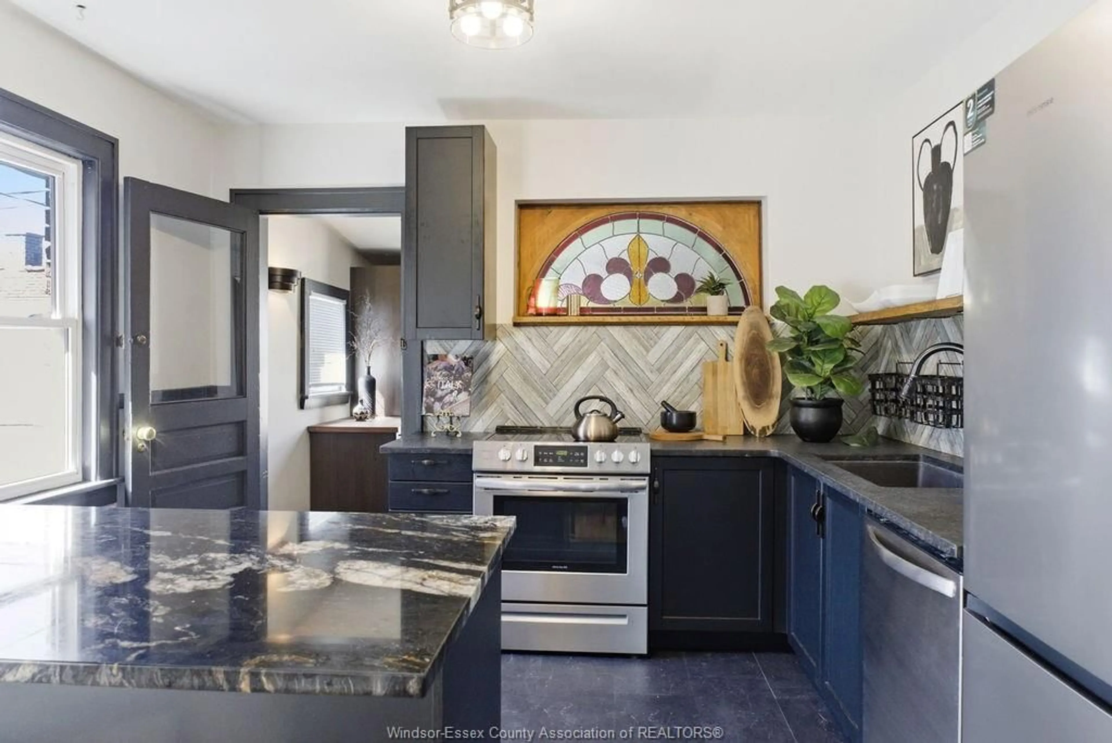 Contemporary kitchen, ceramic/tile floor for 557 MOY AVE, Windsor Ontario N9A 2N3