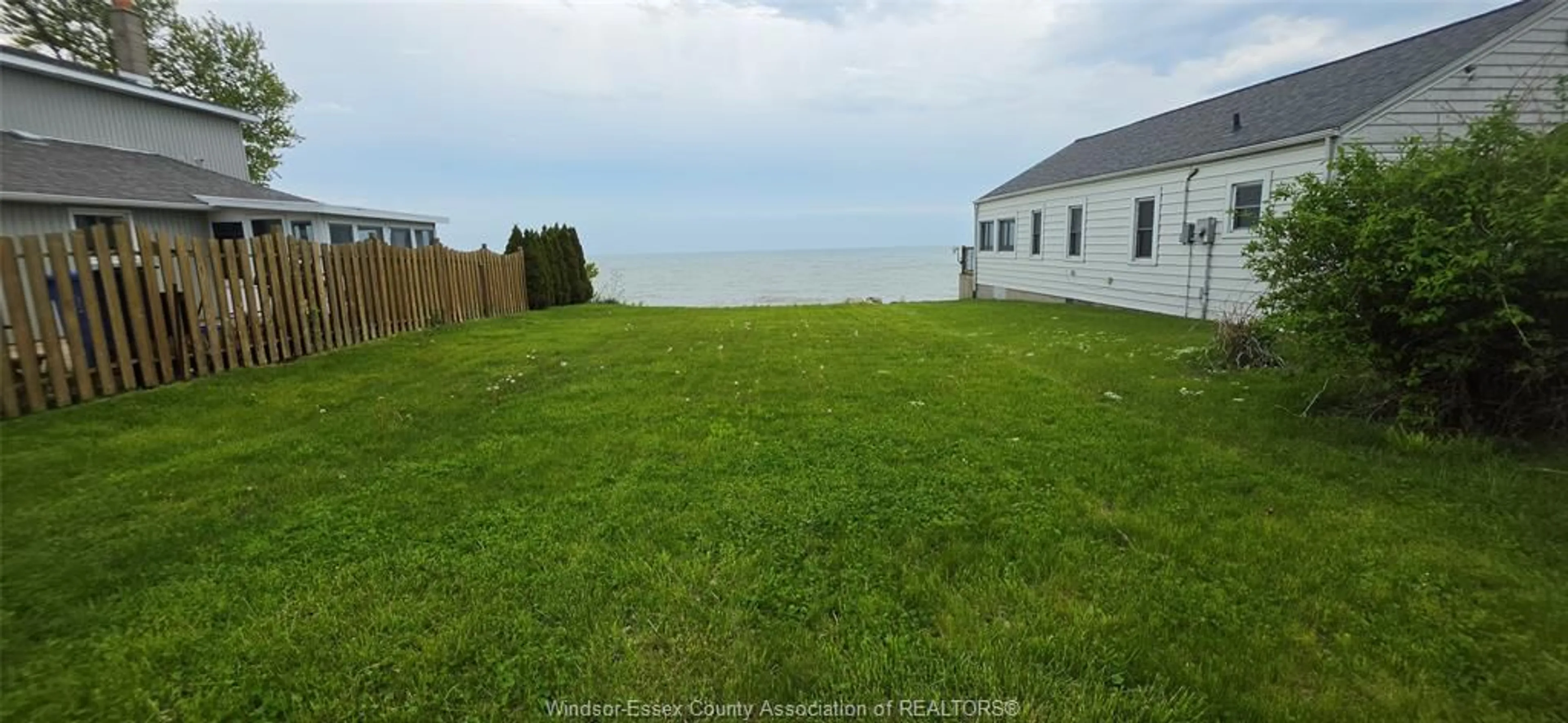 A pic from outside/outdoor area/front of a property/back of a property/a pic from drone, water/lake/river/ocean view for 1535 Heritage Rd, Kingsville Ontario N9Y 2E6