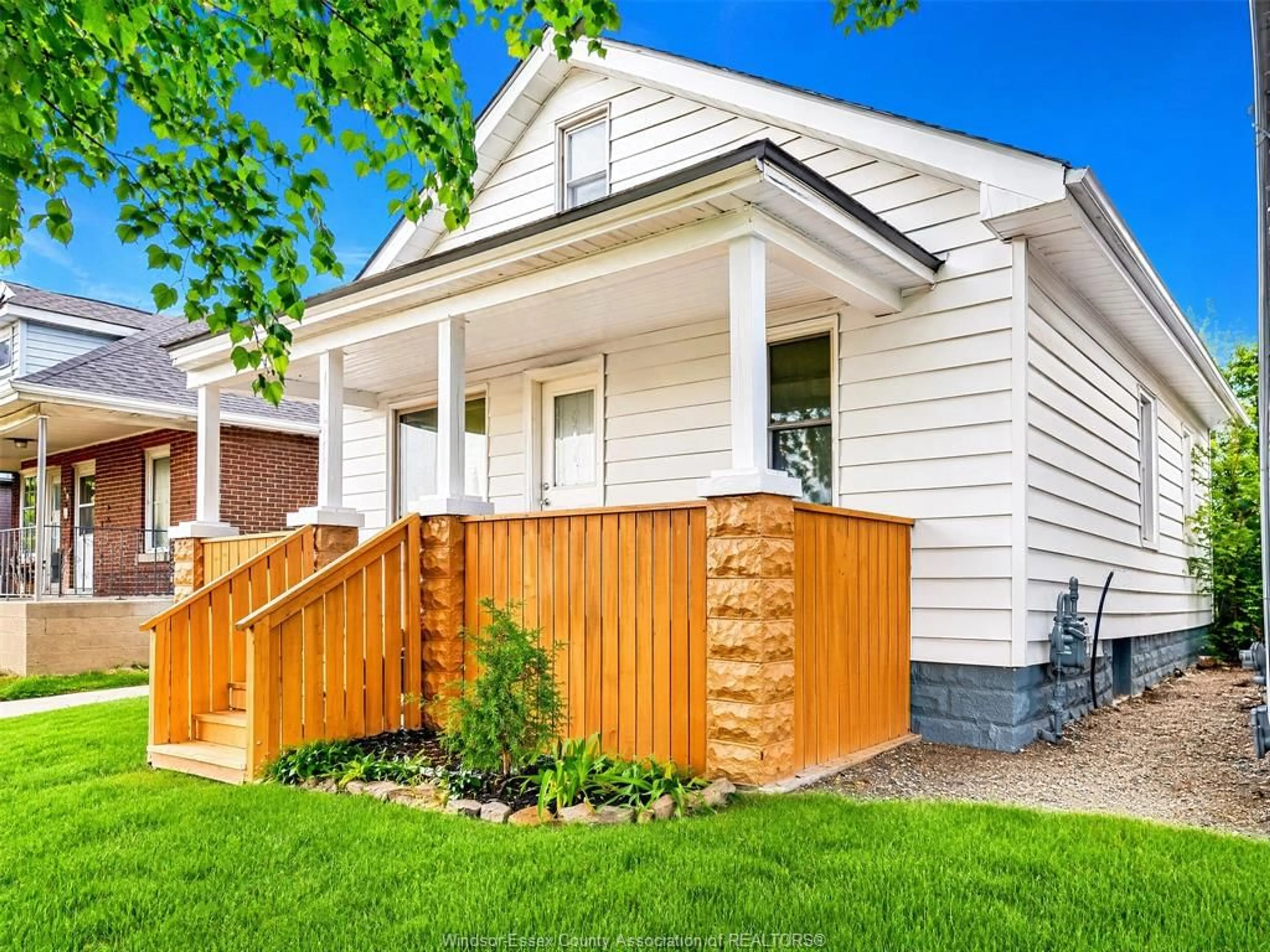 Home with vinyl exterior material, street for 1054 FELIX Ave, Windsor Ontario N9C 3L5