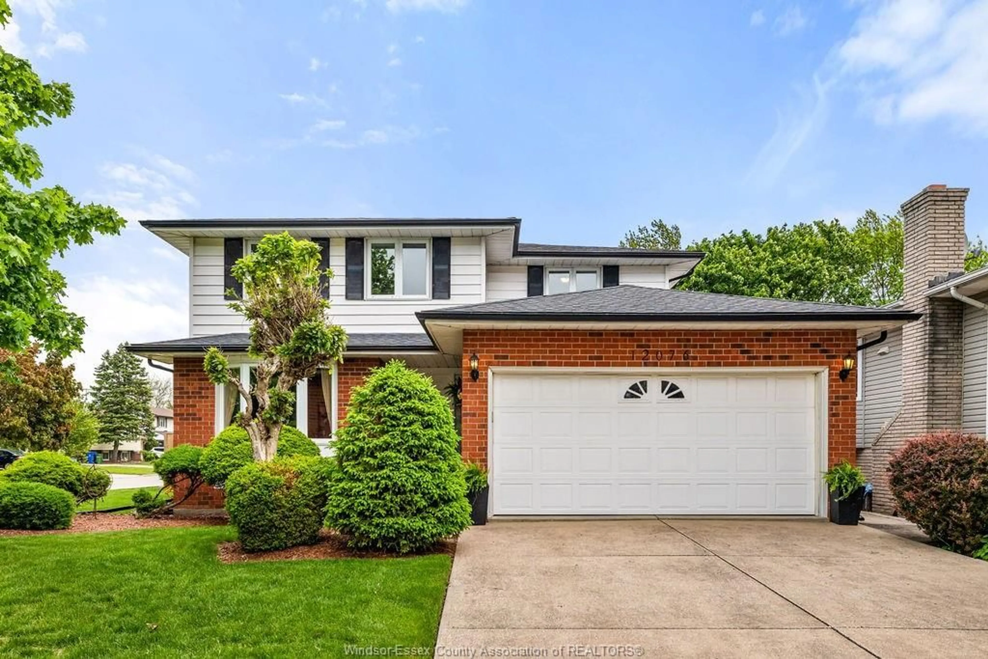 Home with brick exterior material, street for 12076 ST. THOMAS Cres, Tecumseh Ontario N8N 3V7