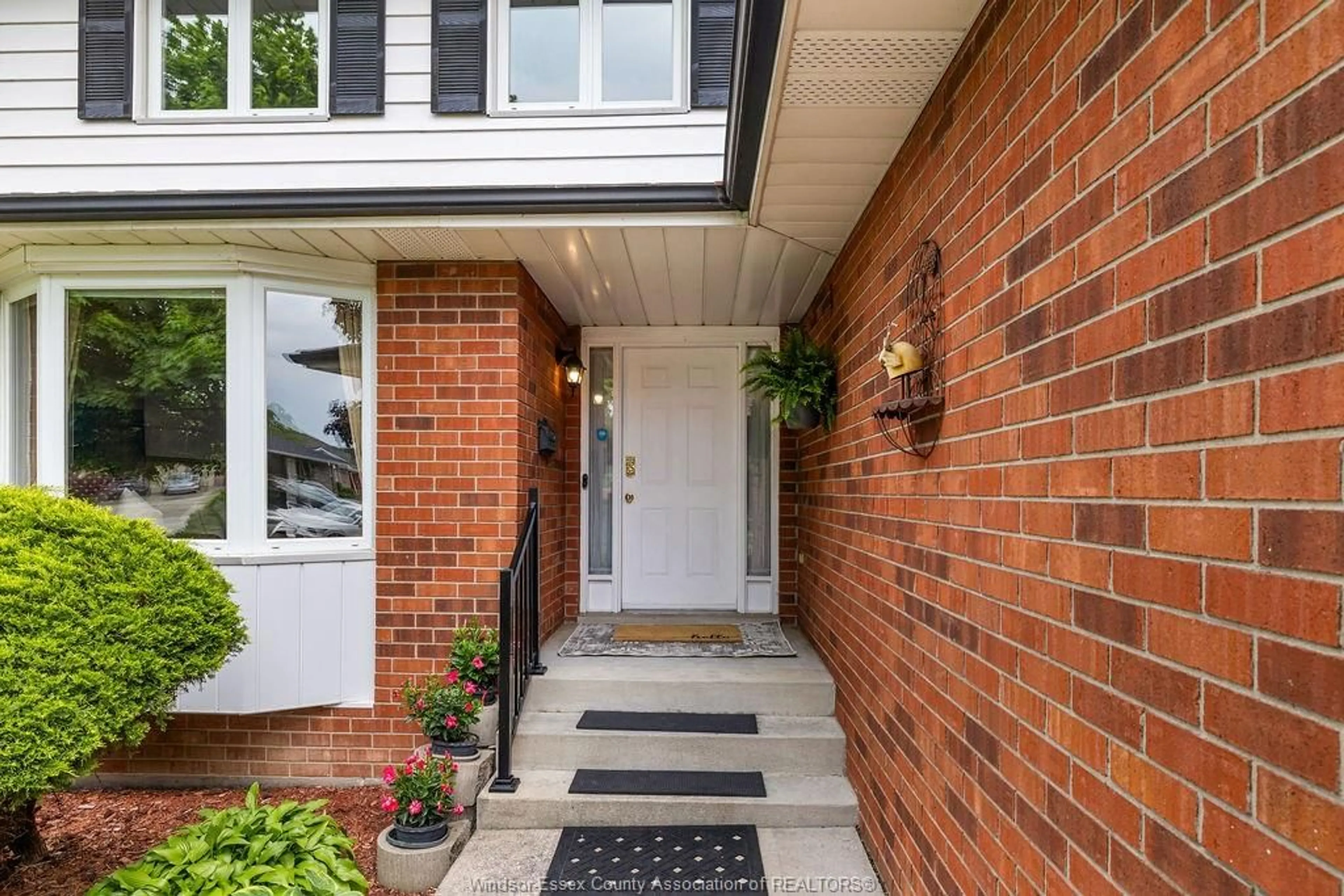 Home with brick exterior material, street for 12076 ST. THOMAS Cres, Tecumseh Ontario N8N 3V7