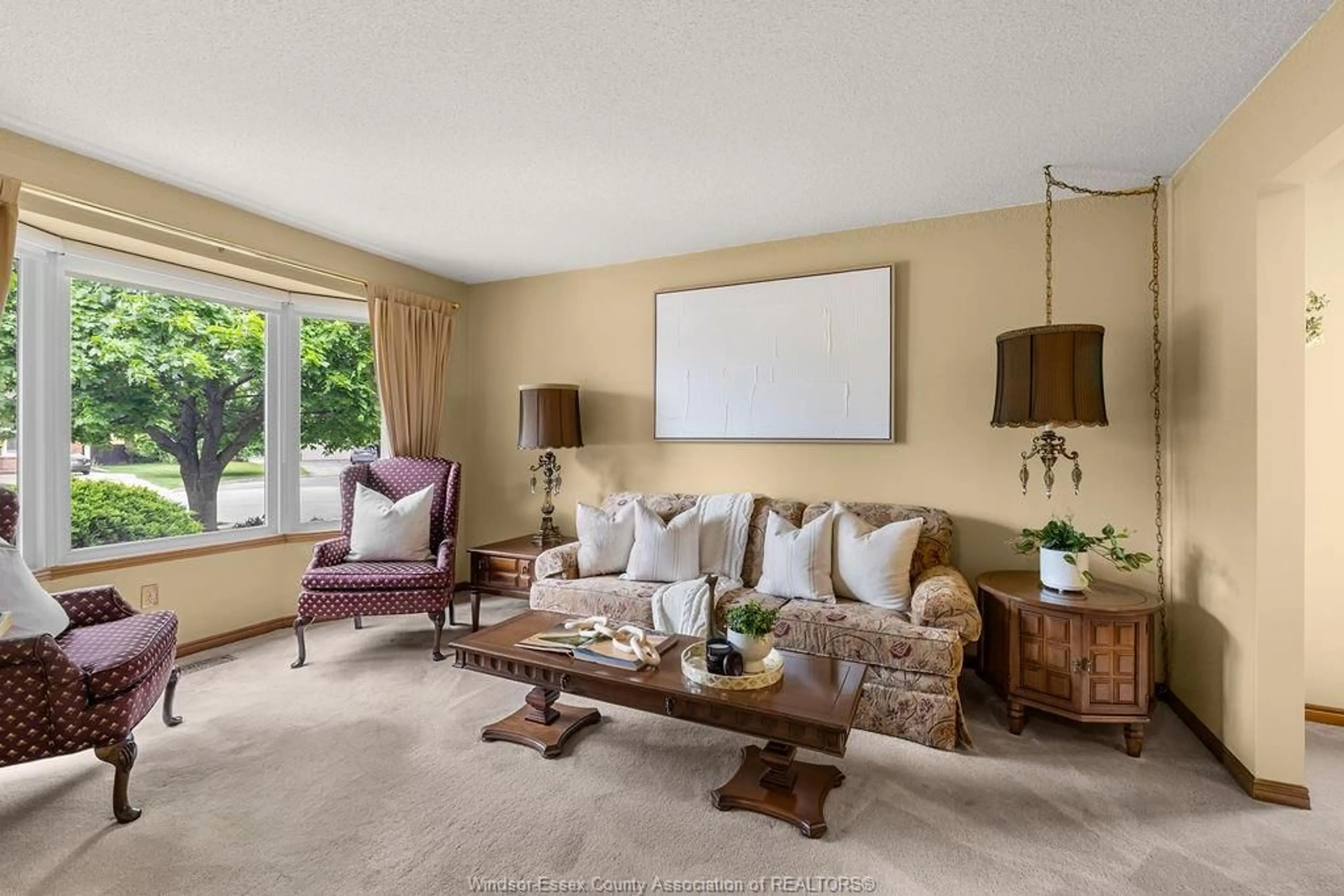 Living room with furniture, carpet floor for 12076 ST. THOMAS Cres, Tecumseh Ontario N8N 3V7