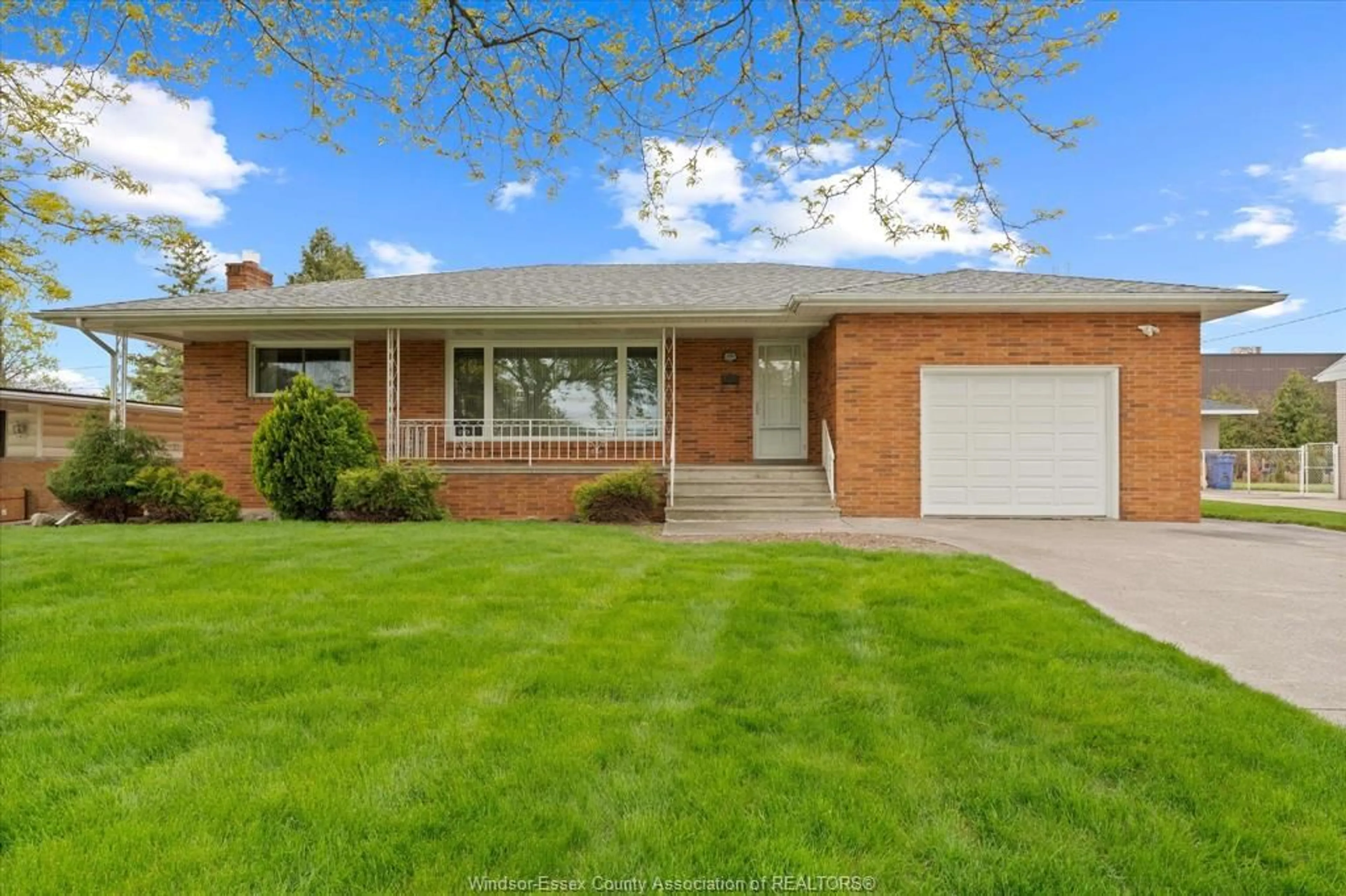 Home with brick exterior material, street for 3299 Woodlawn Ave, Windsor Ontario N8W 2J1