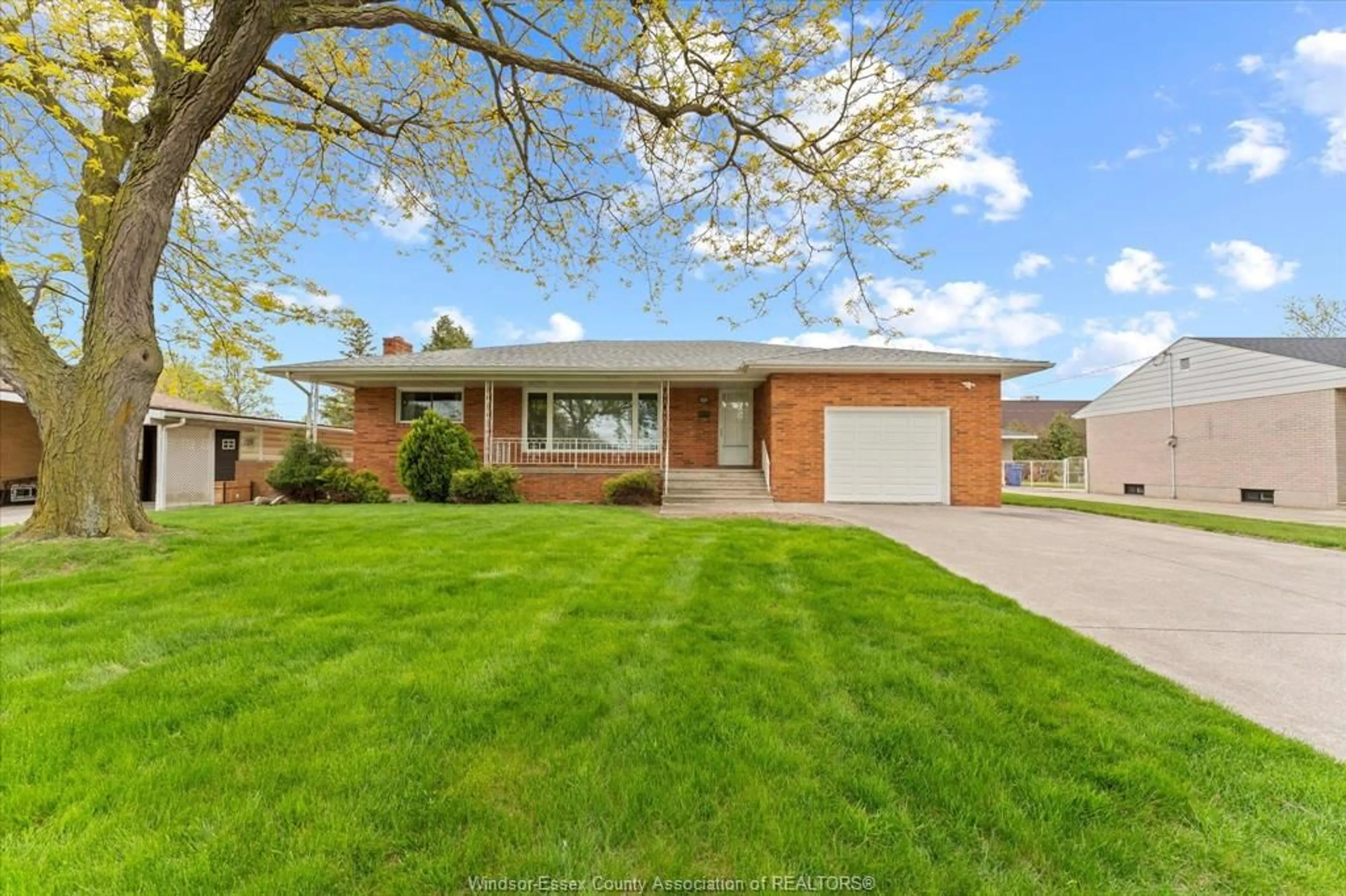 Home with brick exterior material, street for 3299 Woodlawn Ave, Windsor Ontario N8W 2J1