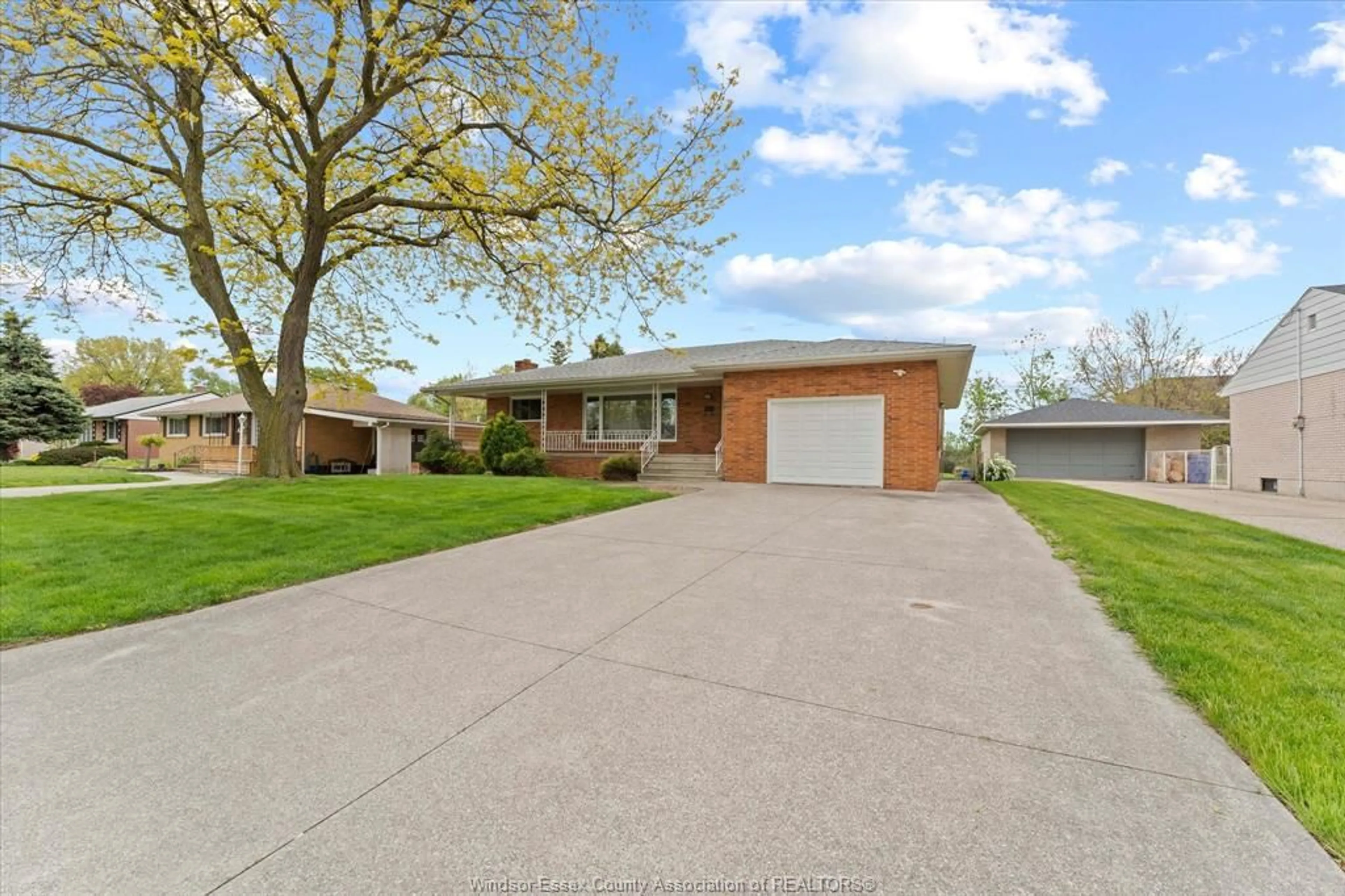 Home with brick exterior material, street for 3299 Woodlawn Ave, Windsor Ontario N8W 2J1