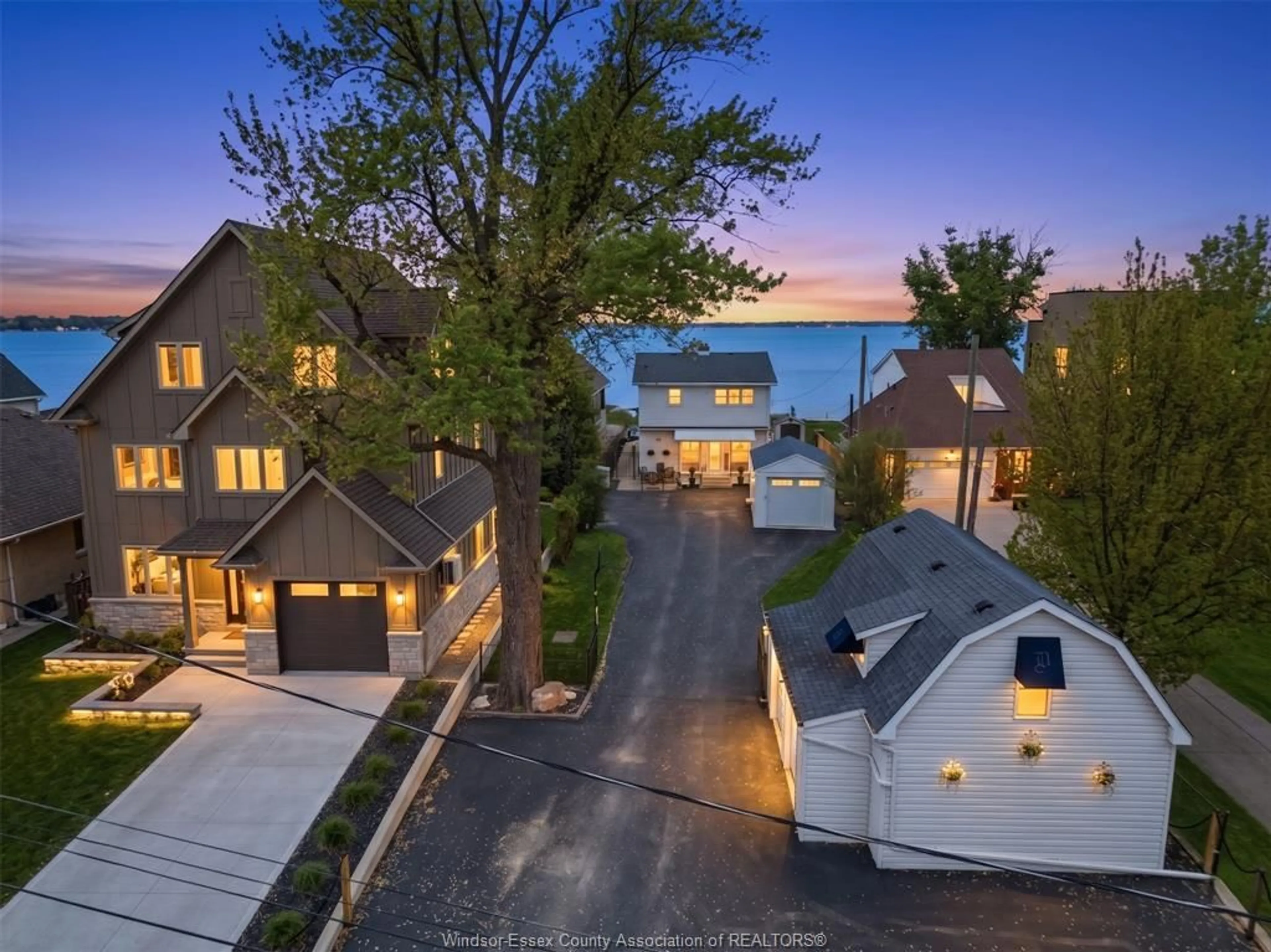 A pic from outside/outdoor area/front of a property/back of a property/a pic from drone, street for 12086 RIVERSIDE Dr, Tecumseh Ontario N8P 1A9
