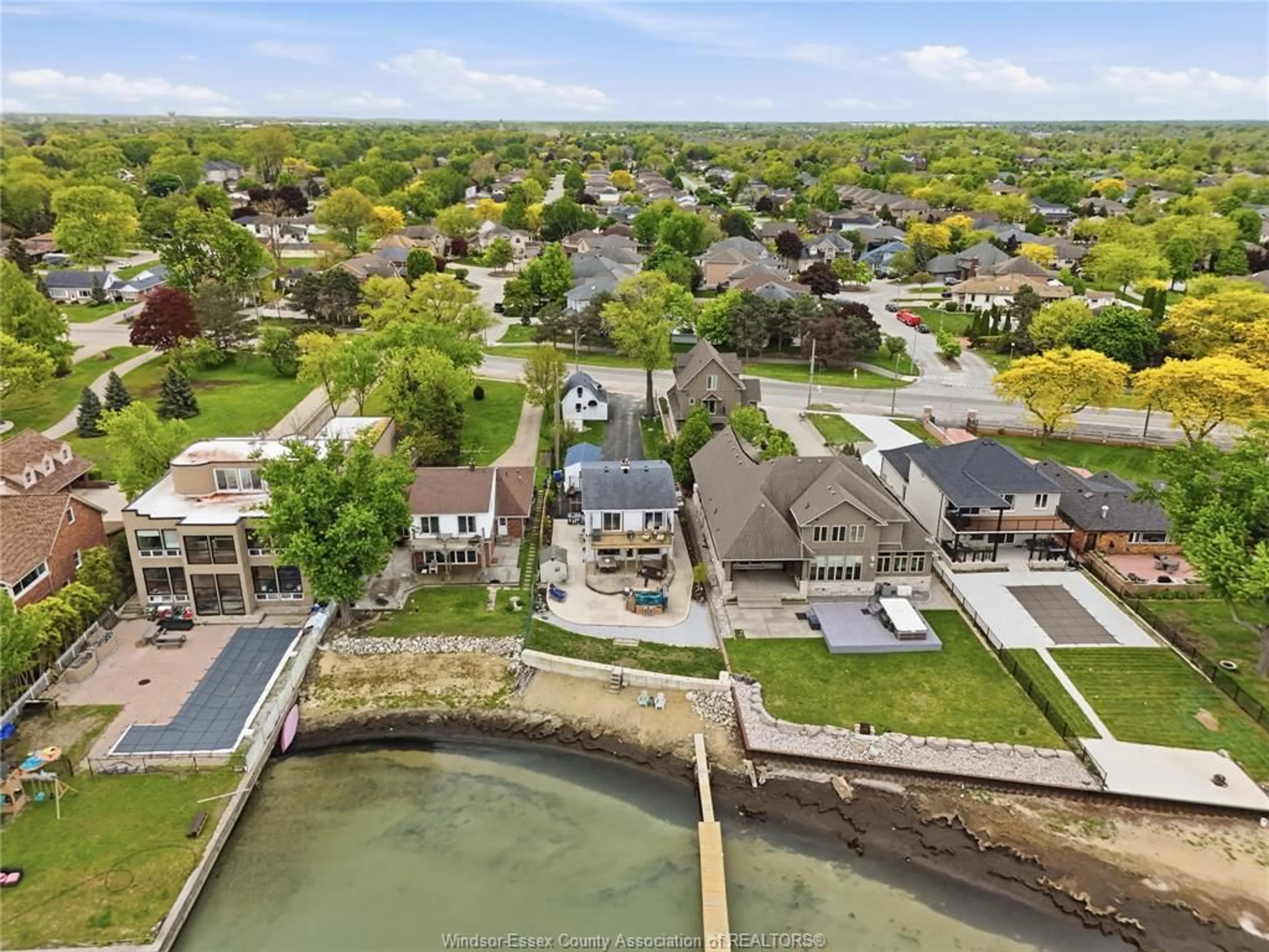 A pic from outside/outdoor area/front of a property/back of a property/a pic from drone, water/lake/river/ocean view for 12086 RIVERSIDE Dr, Tecumseh Ontario N8P 1A9