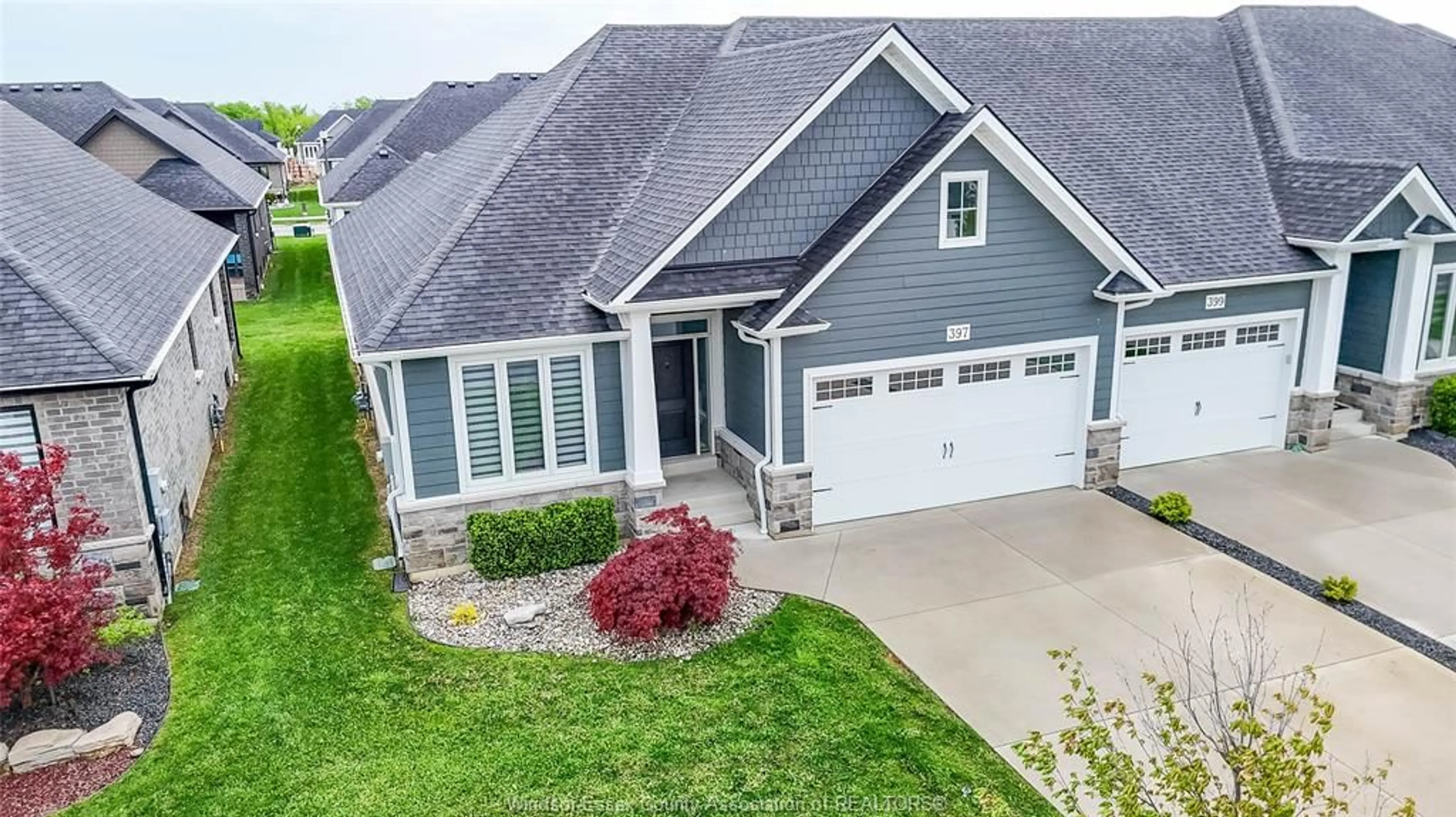 A pic from outside/outdoor area/front of a property/back of a property/a pic from drone, street for 397 CASERTA, Lakeshore Ontario N0R 1A0