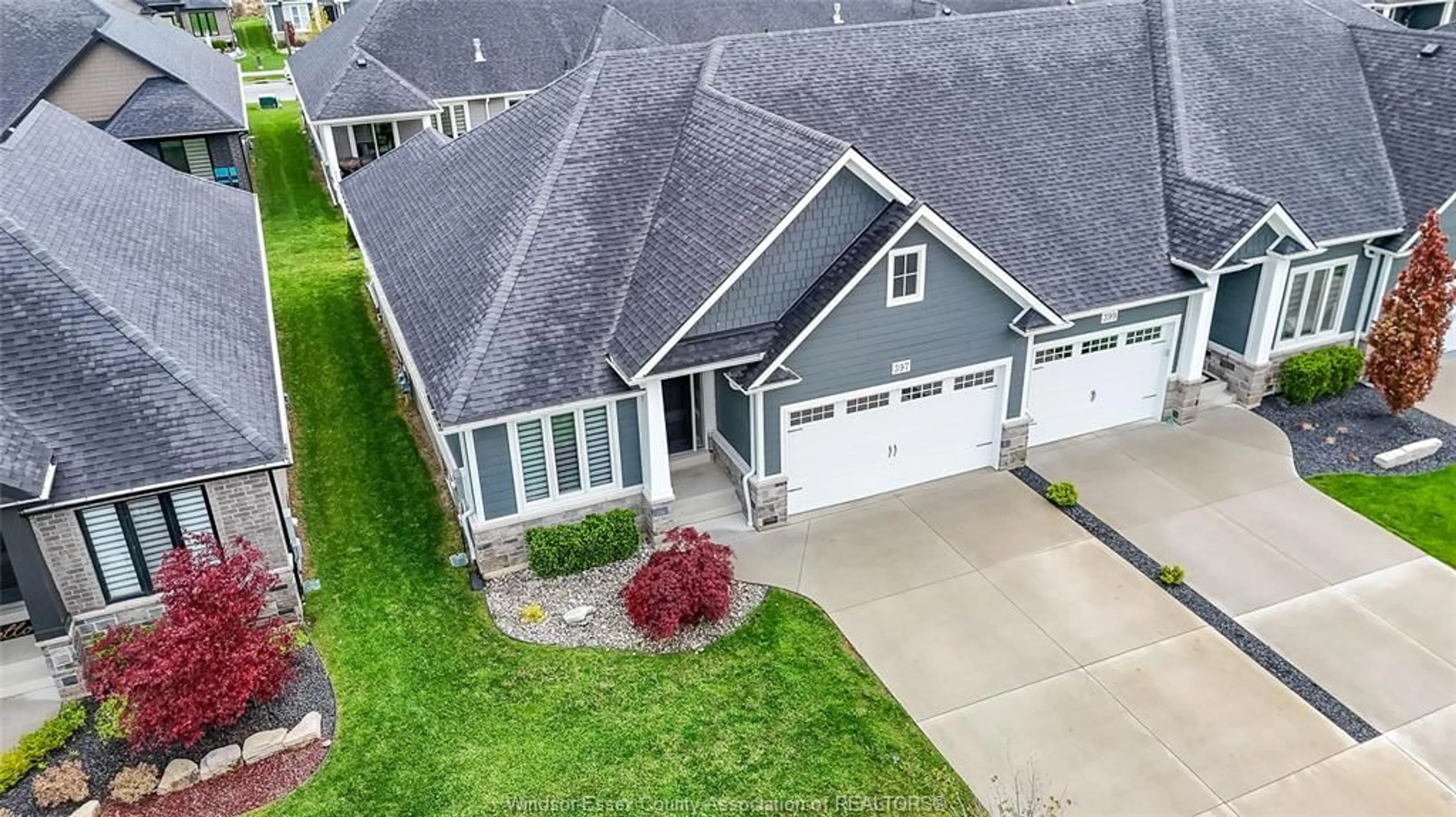 A pic from outside/outdoor area/front of a property/back of a property/a pic from drone, street for 397 CASERTA, Lakeshore Ontario N0R 1A0