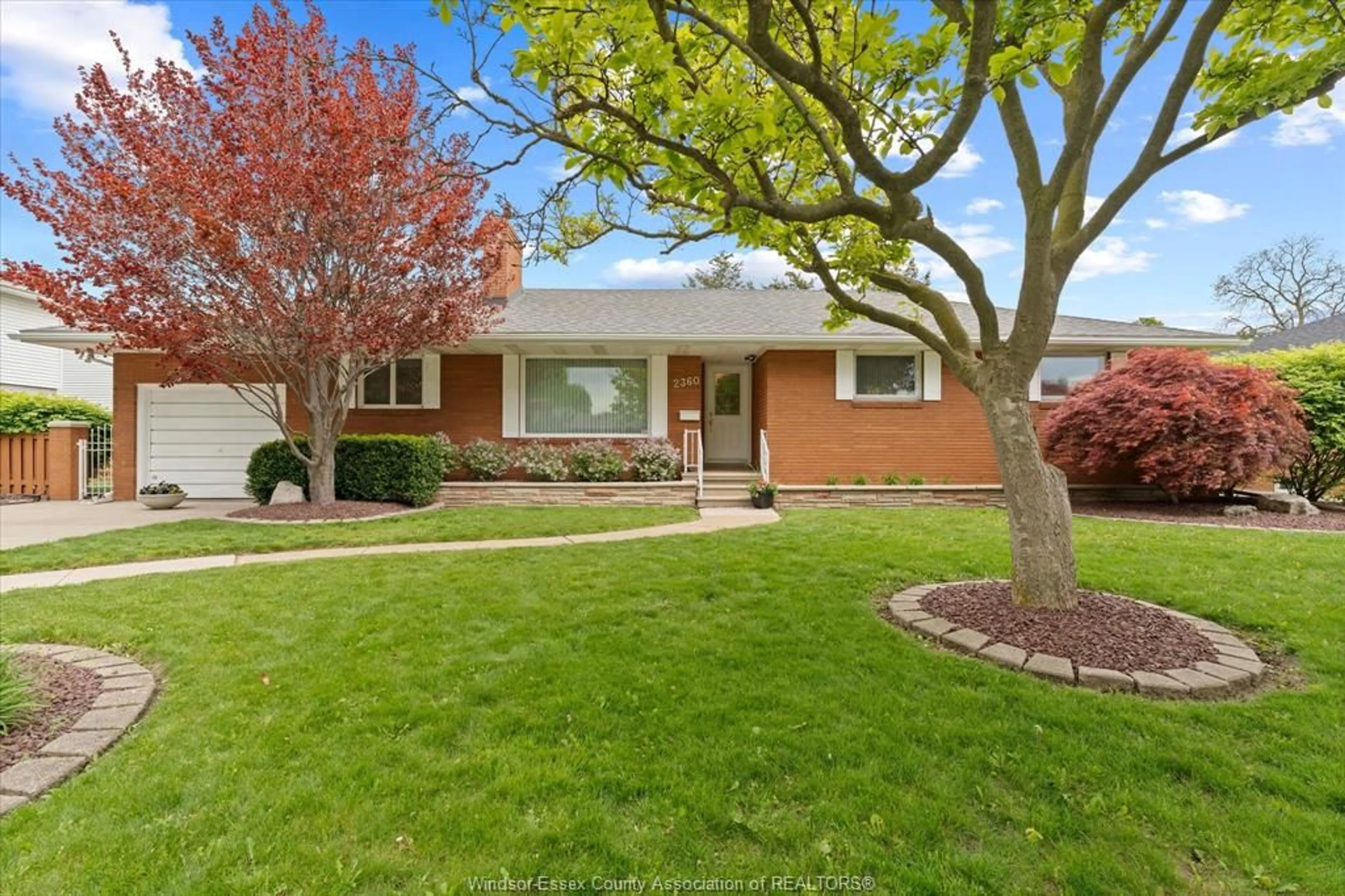 Home with brick exterior material, street for 2360 LEONARD Rd, Windsor Ontario N8W 4L7