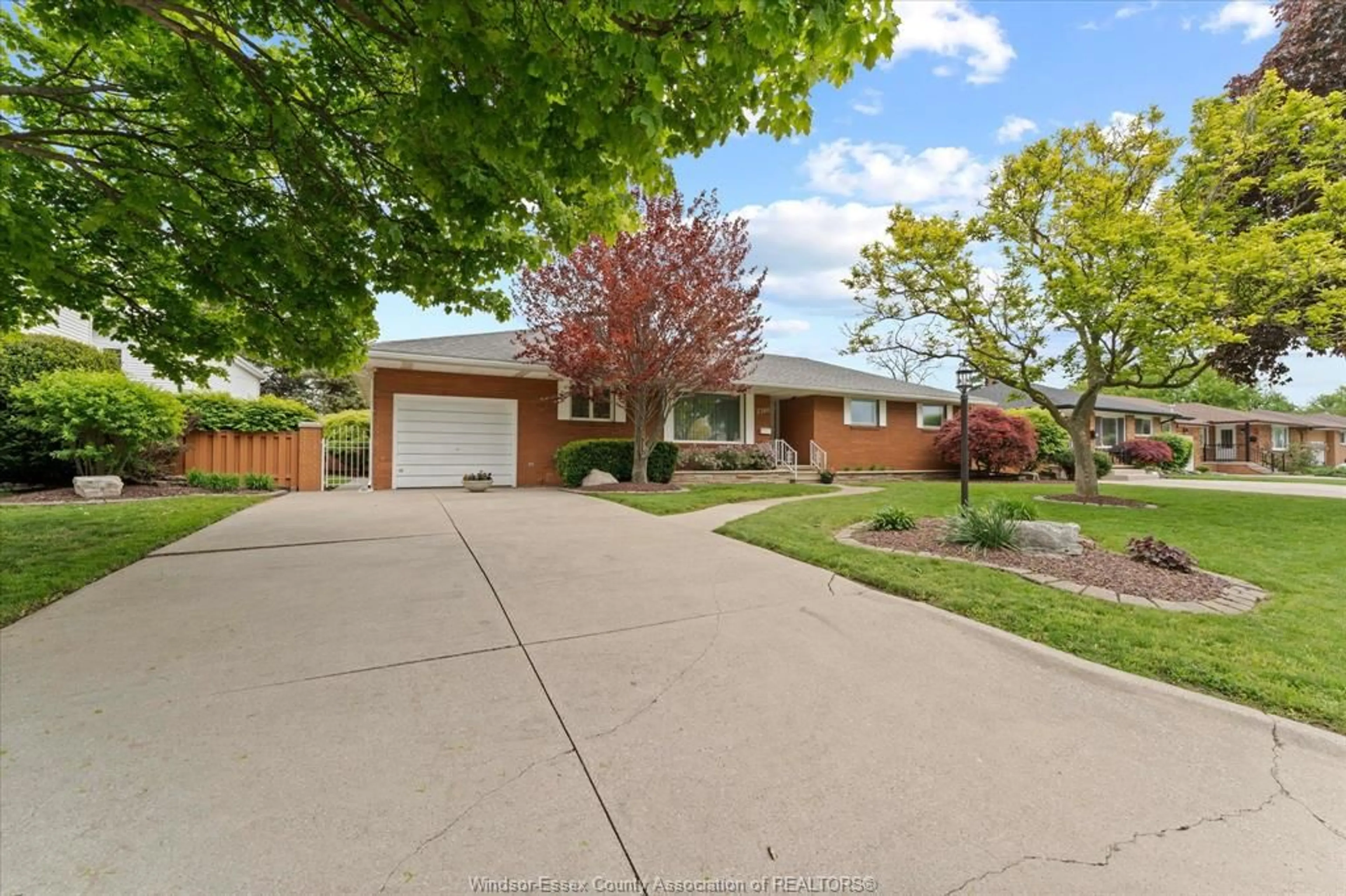 Home with brick exterior material, street for 2360 LEONARD Rd, Windsor Ontario N8W 4L7