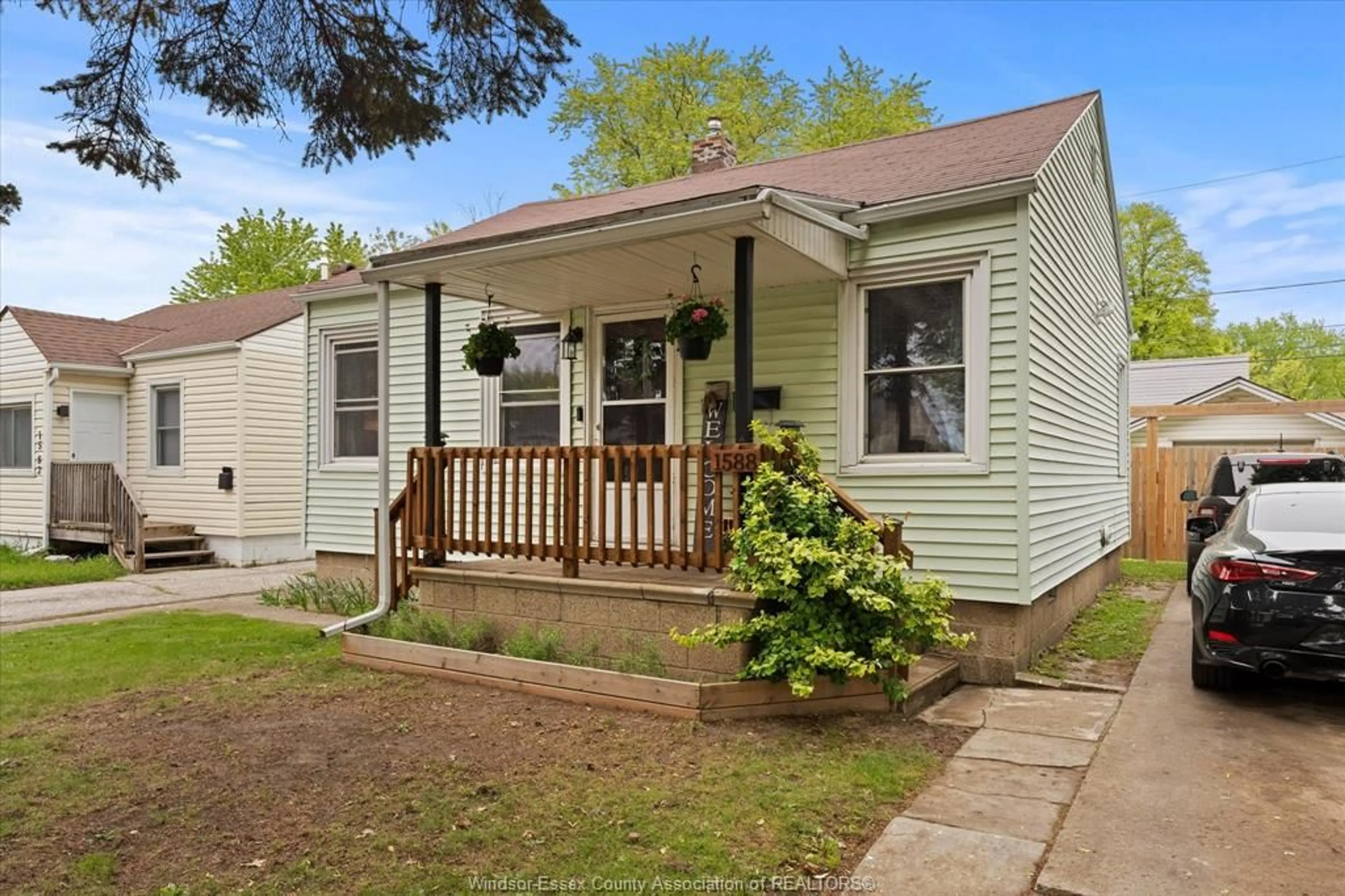 Home with vinyl exterior material, street for 1588 CENTRAL Ave, Windsor Ontario N8Y 3V8