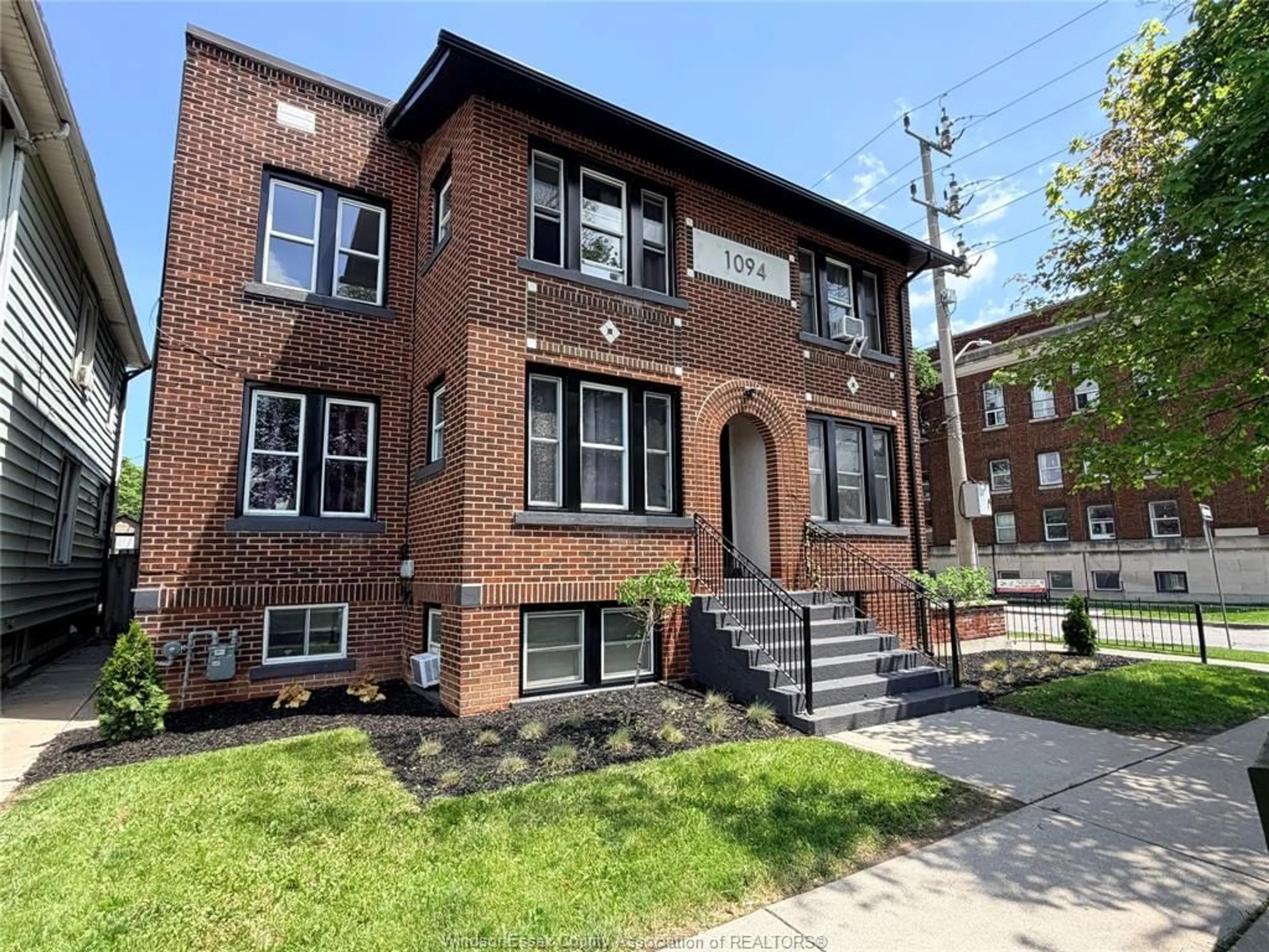 Home with brick exterior material, street for 1094 Lincoln Rd, Windsor Ontario N8Y 2H4