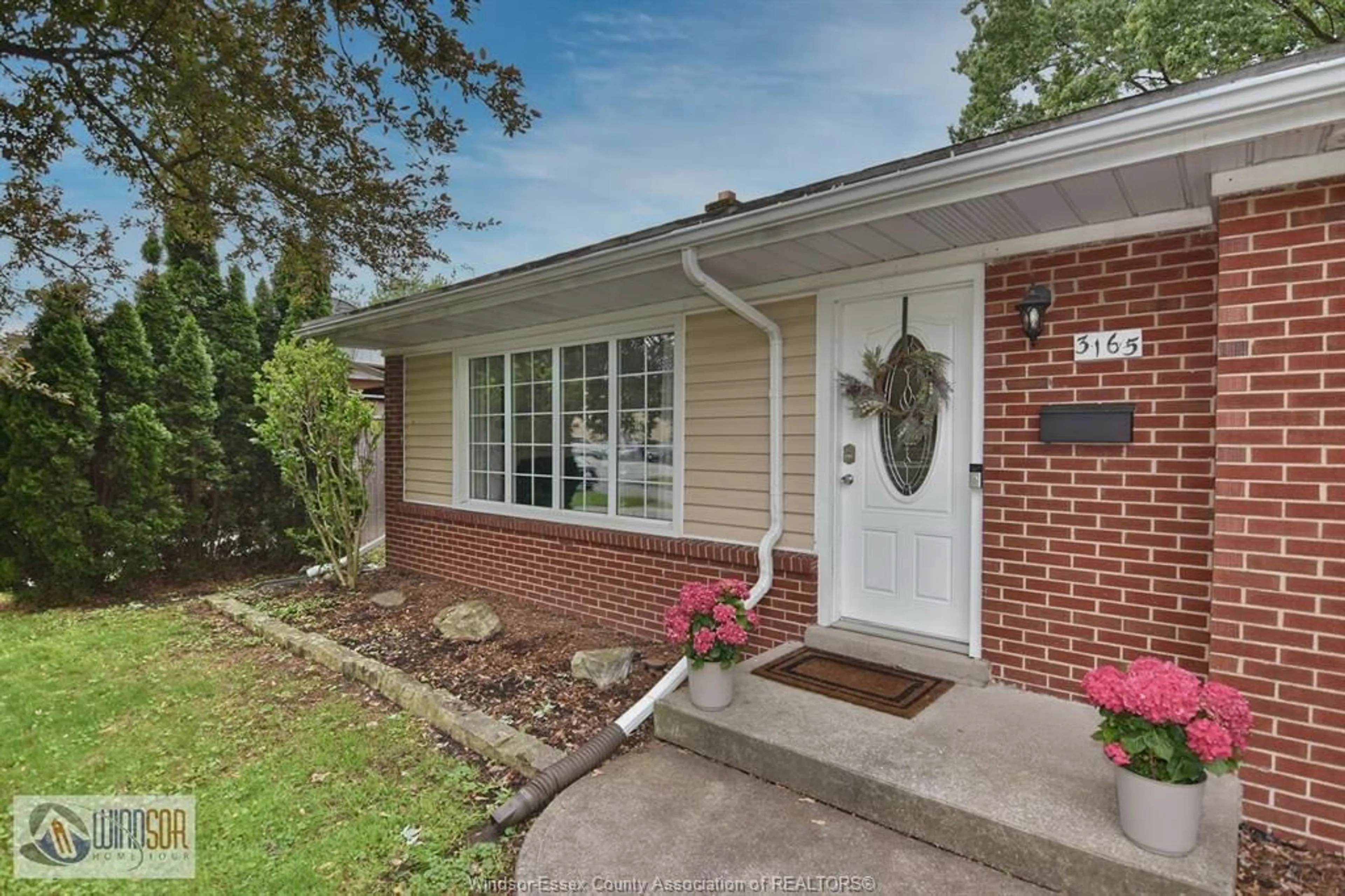 Home with brick exterior material, street for 3165 VIRGINIA PARK Ave, Windsor Ontario N9E 2C1