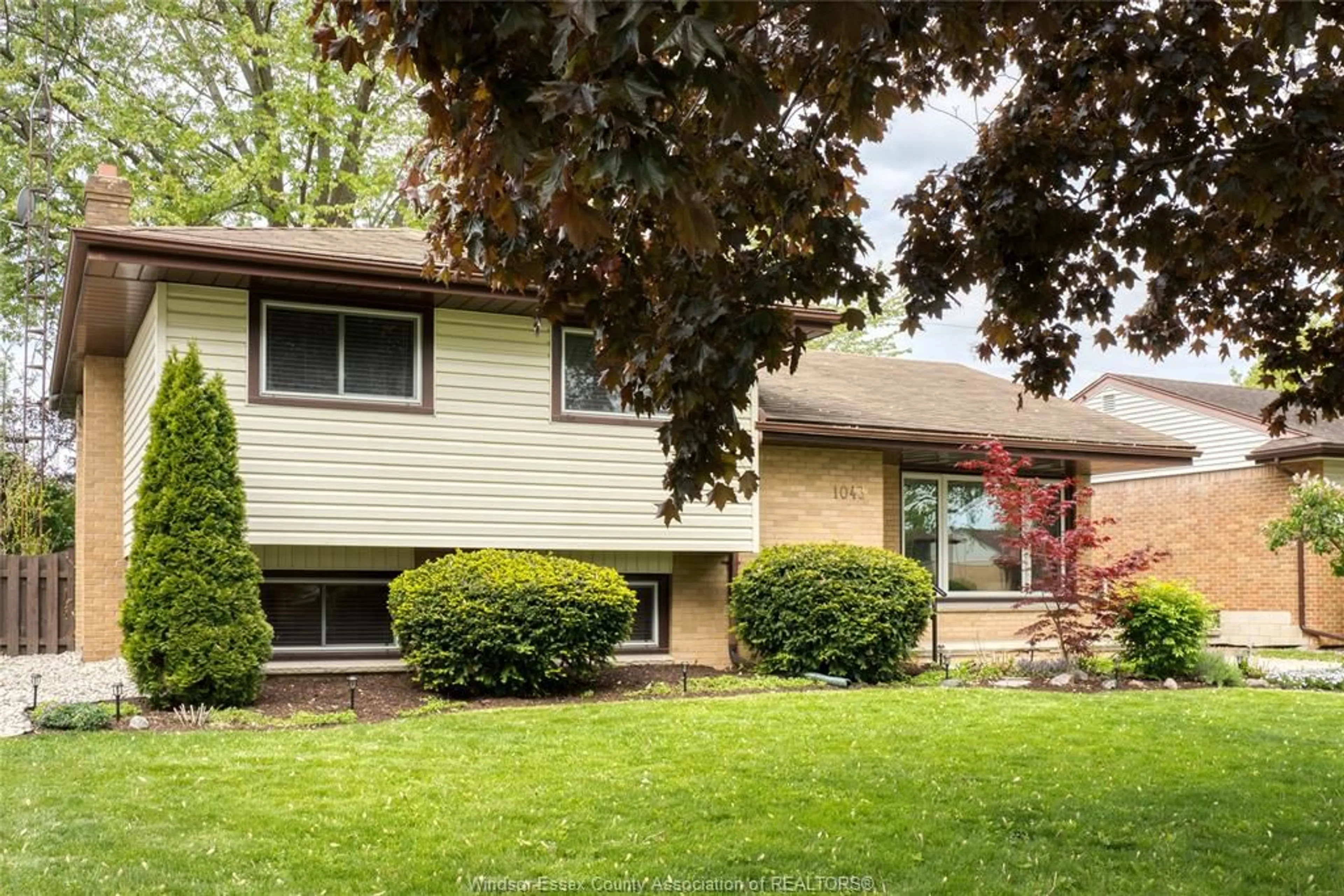 Home with vinyl exterior material, street for 1043 WESTCHESTER Dr, Windsor Ontario N8S 3Z1