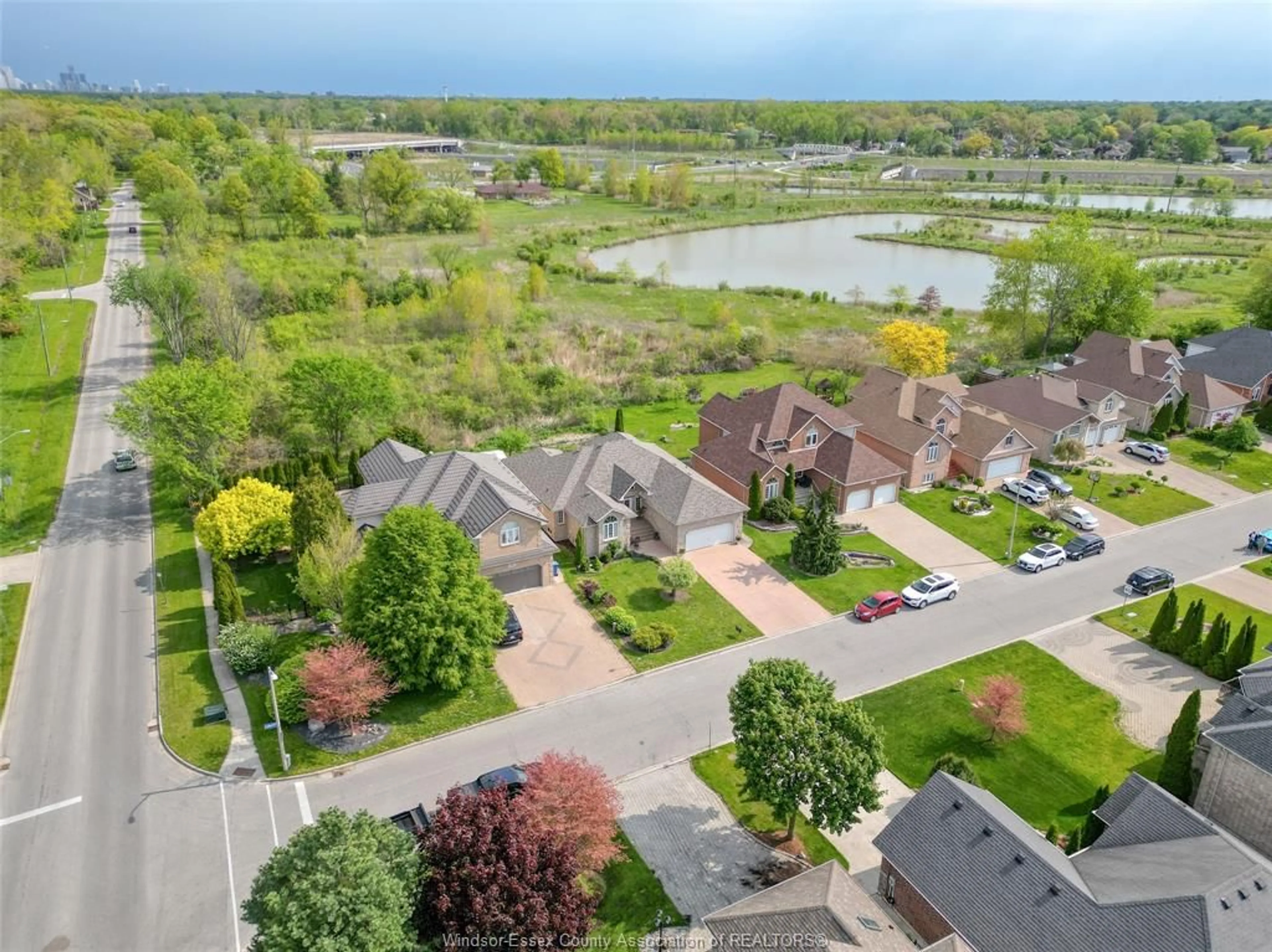 A pic from outside/outdoor area/front of a property/back of a property/a pic from drone, water/lake/river/ocean view for 2703 LOMBARDY Cres, LaSalle Ontario N9H 2Z1