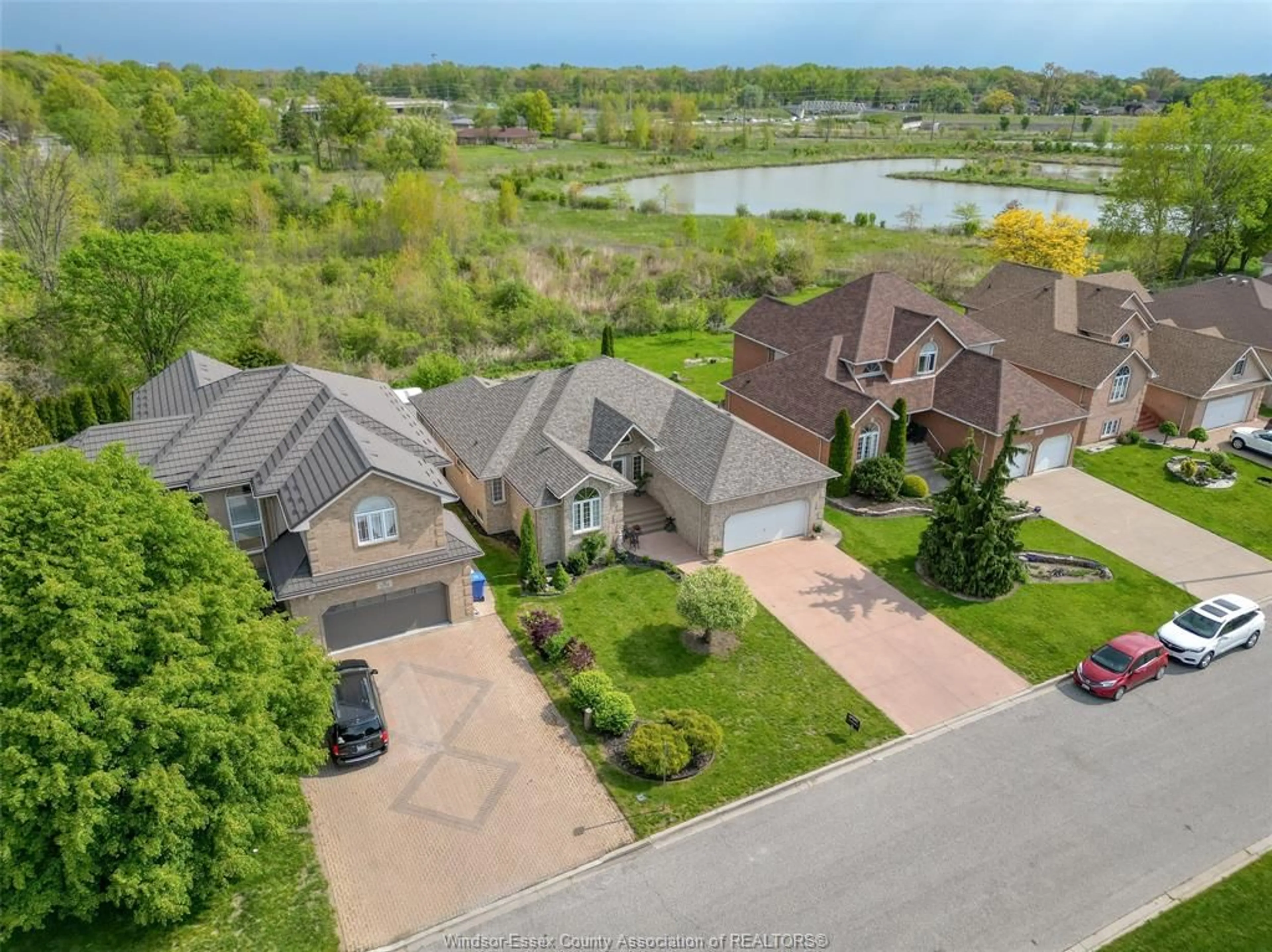 A pic from outside/outdoor area/front of a property/back of a property/a pic from drone, water/lake/river/ocean view for 2703 LOMBARDY Cres, LaSalle Ontario N9H 2Z1