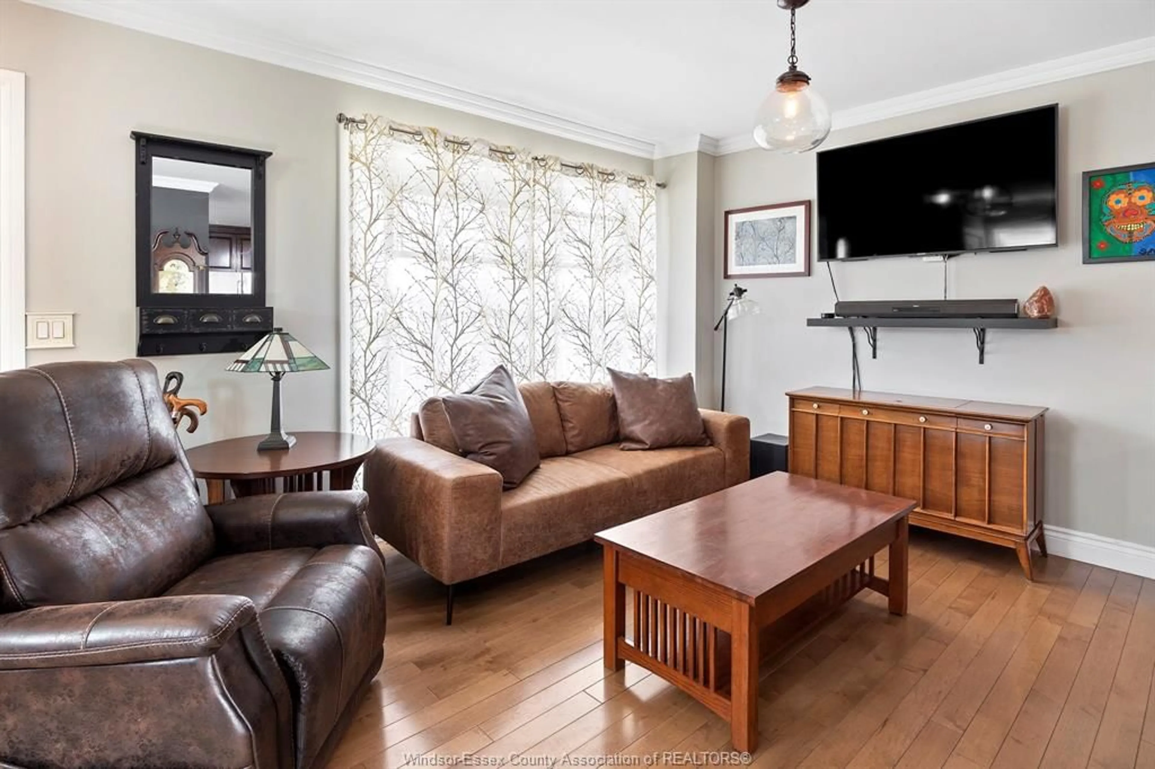 Living room with furniture, wood/laminate floor for 108 MONTROSE St, Windsor Ontario N8X 1A3
