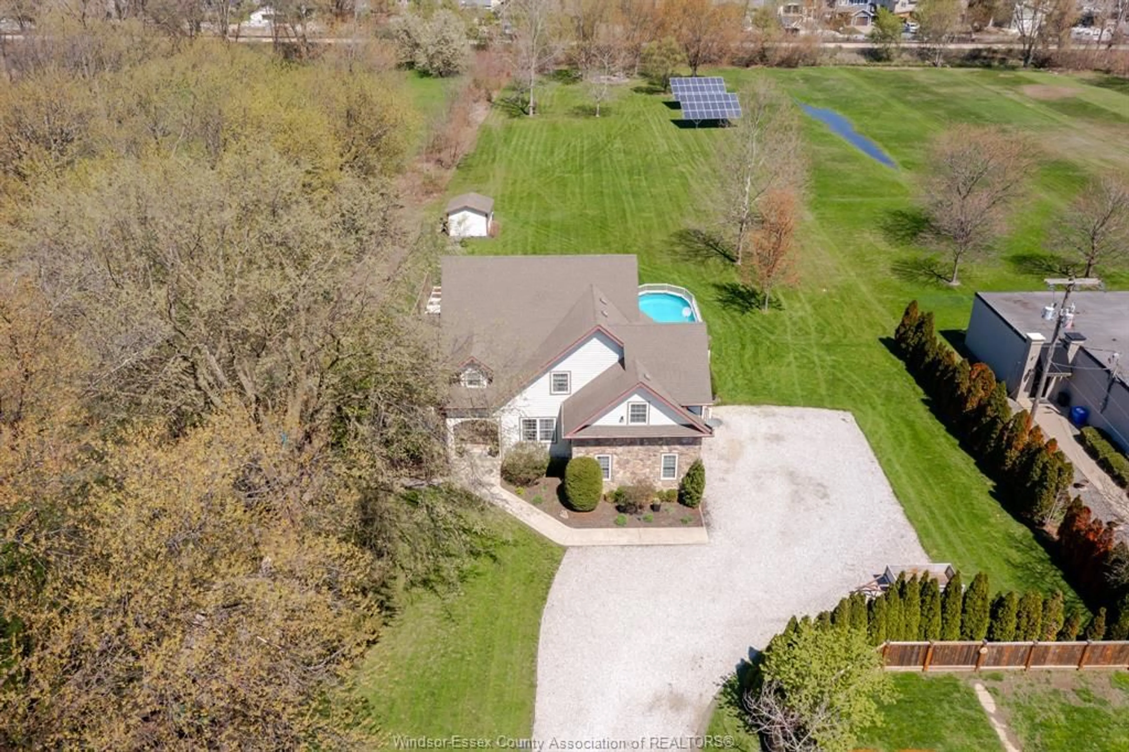 A pic from outside/outdoor area/front of a property/back of a property/a pic from drone, water/lake/river/ocean view for 1332 COUNTY RD 22, Lakeshore Ontario N0R 1A0
