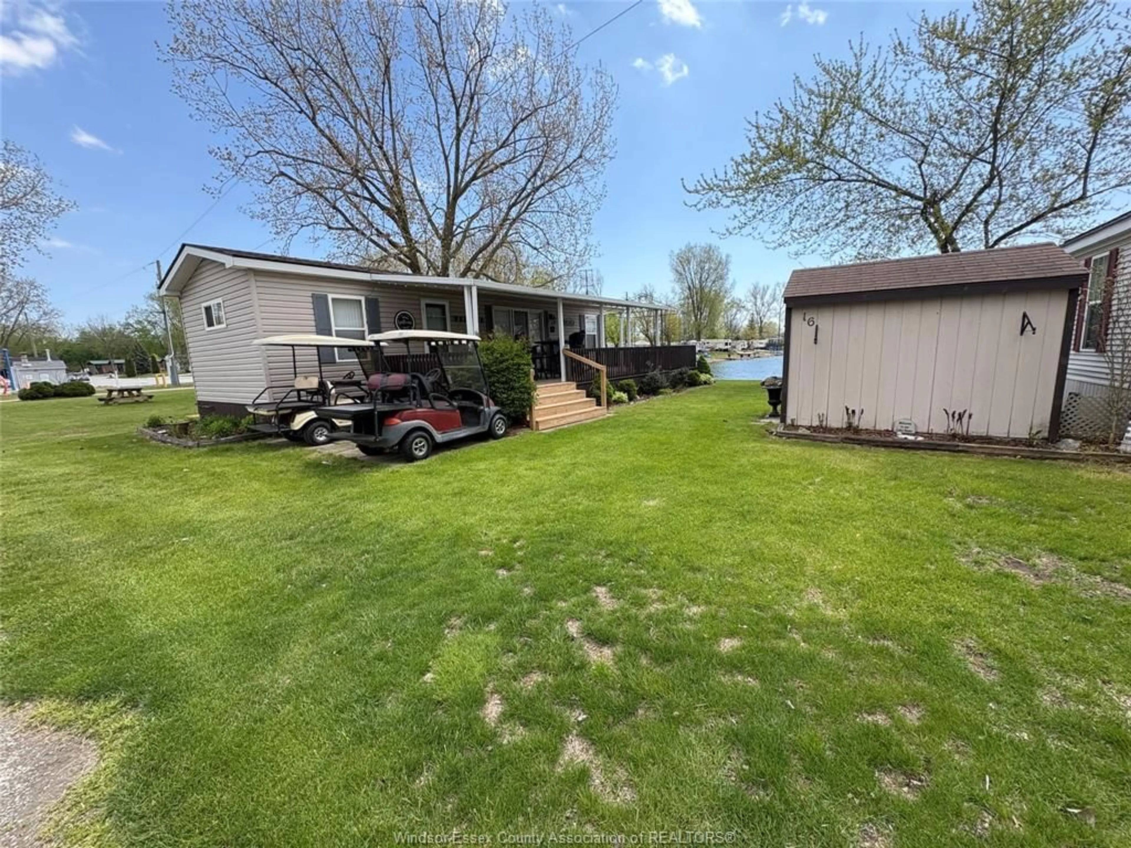 A pic from outside/outdoor area/front of a property/back of a property/a pic from drone, water/lake/river/ocean view for 16 MULBERRY Lane, Leamington Ontario N0P 2G0