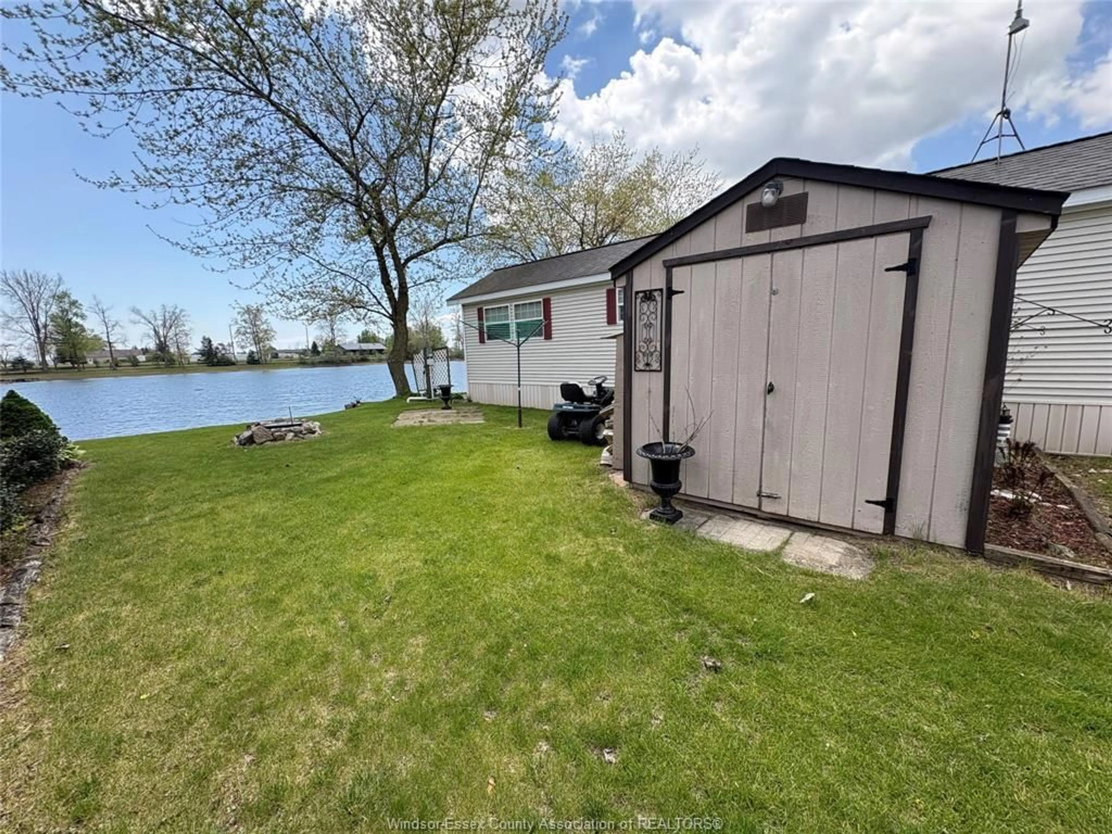 A pic from outside/outdoor area/front of a property/back of a property/a pic from drone, water/lake/river/ocean view for 16 MULBERRY Lane, Leamington Ontario N0P 2G0
