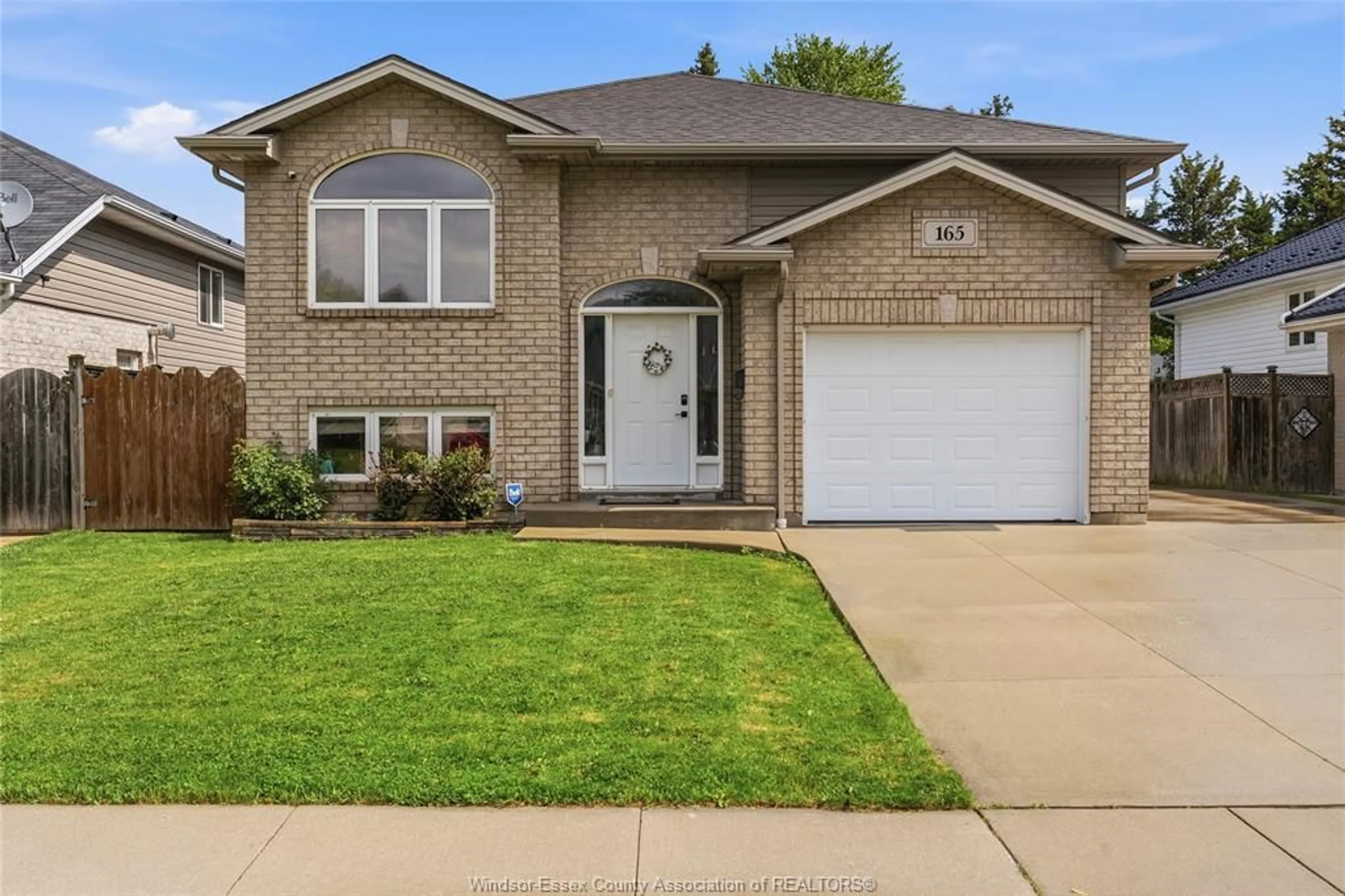 Home with brick exterior material, street for 165 THOMAS Ave, Wallaceburg Ontario N8A 5H5