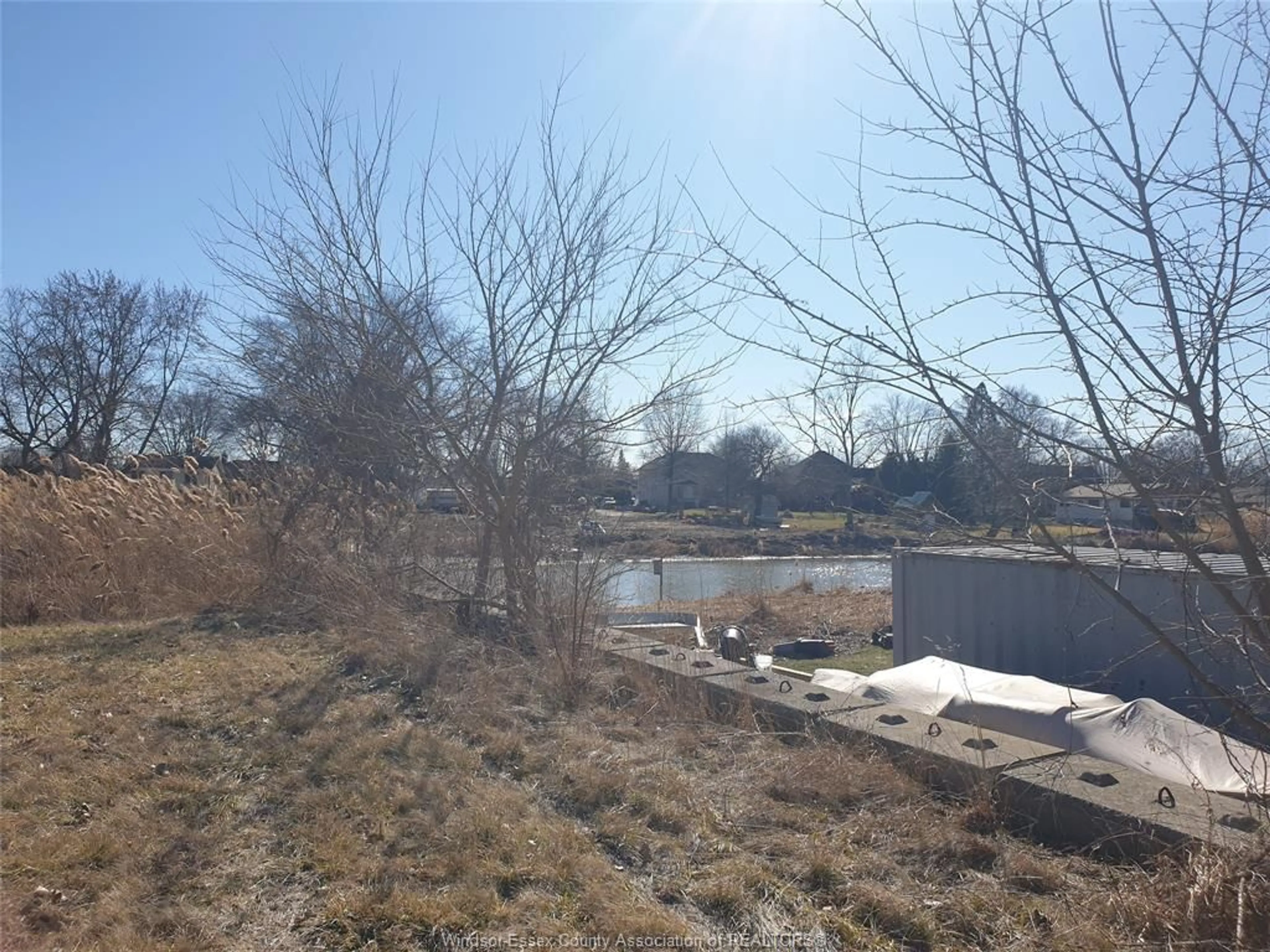 A pic from outside/outdoor area/front of a property/back of a property/a pic from drone, water/lake/river/ocean view for 629 HIGHWAY 18, LaSalle Ontario N9J 1A5