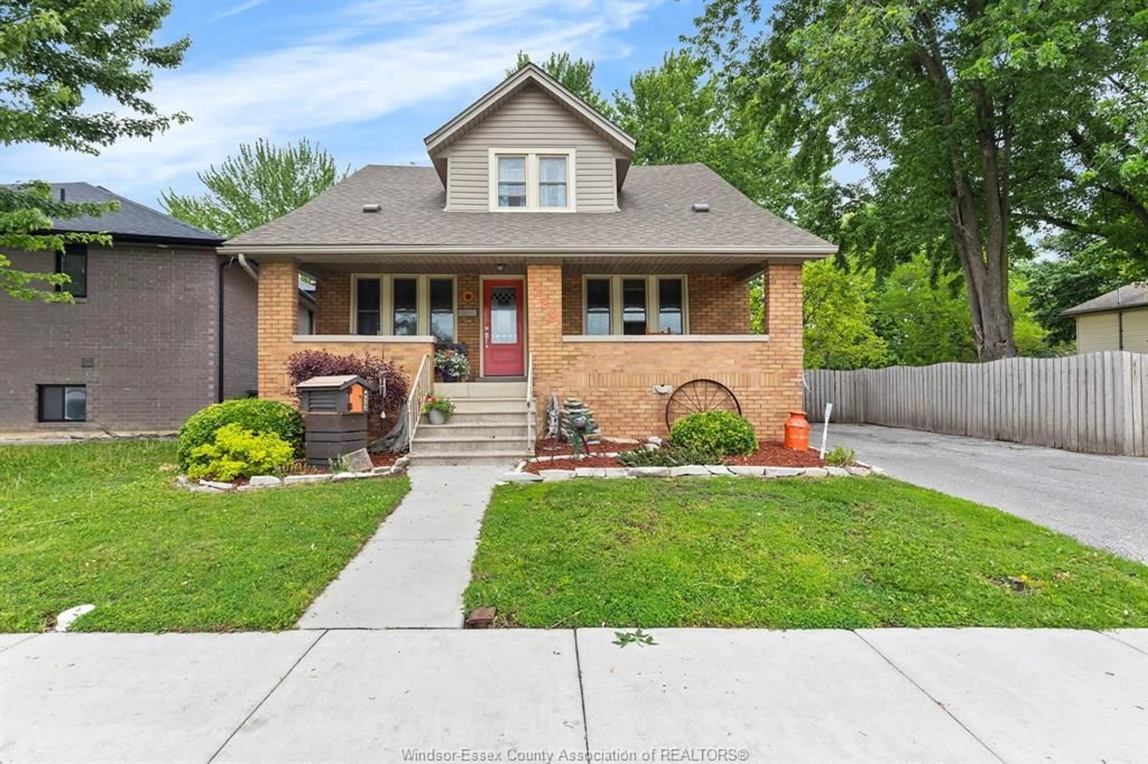 Home with brick exterior material, street for 1288 Cabana Rd, Windsor Ontario N9G 1C1