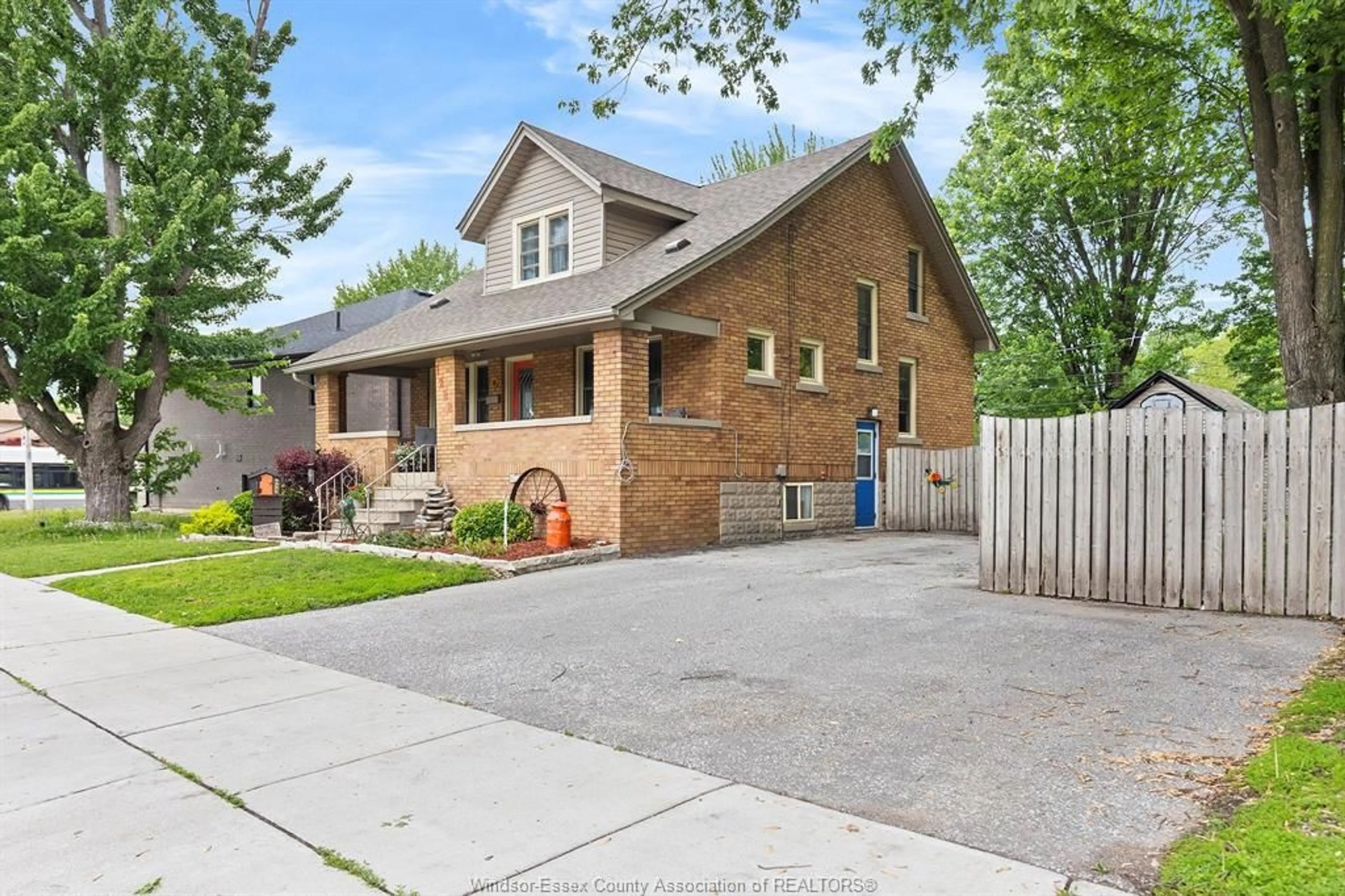 Home with brick exterior material, street for 1288 Cabana Rd, Windsor Ontario N9G 1C1