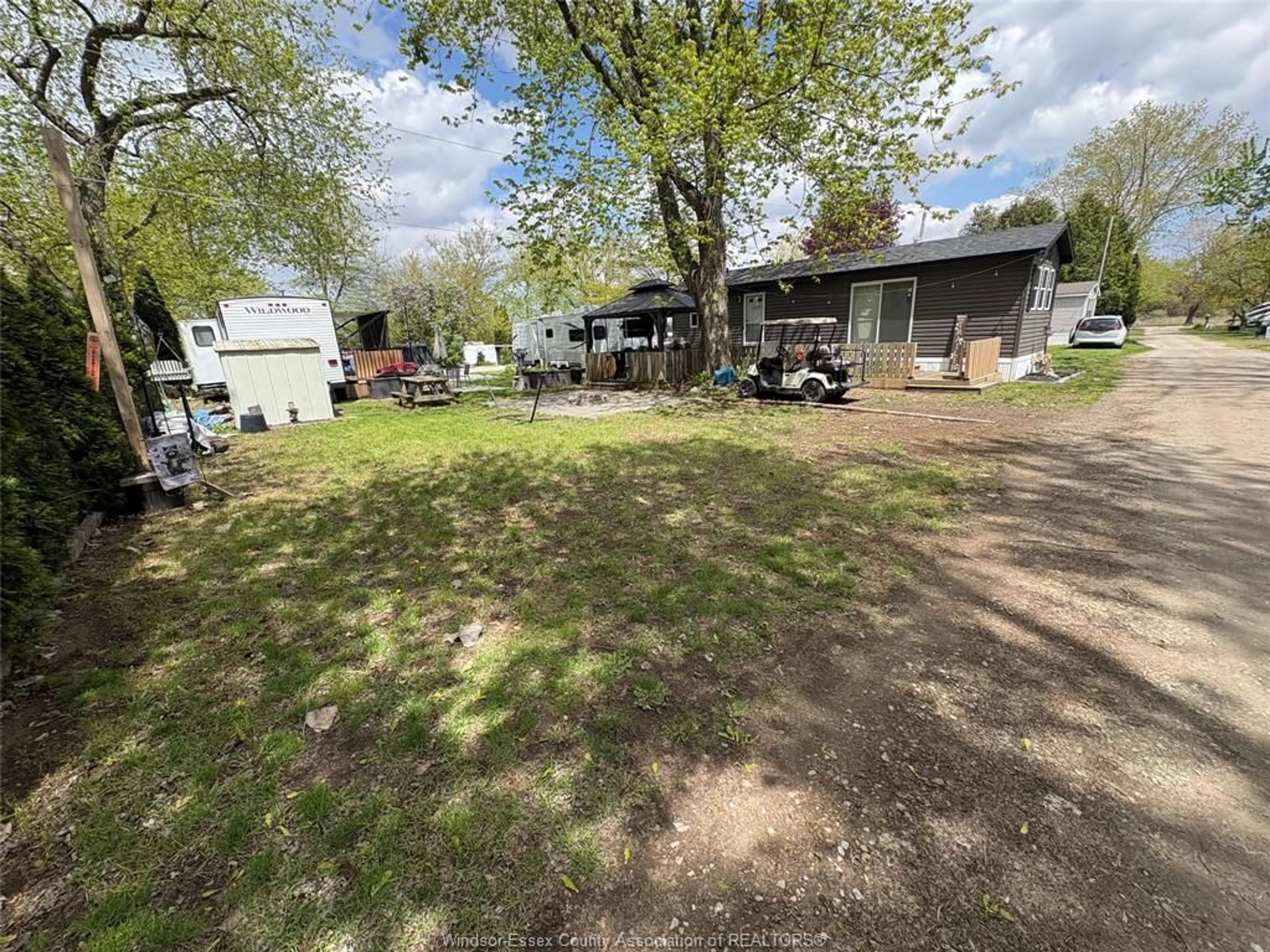A pic from outside/outdoor area/front of a property/back of a property/a pic from drone, street for 22 POPLAR Lane, Leamington Ontario N0P 2G0