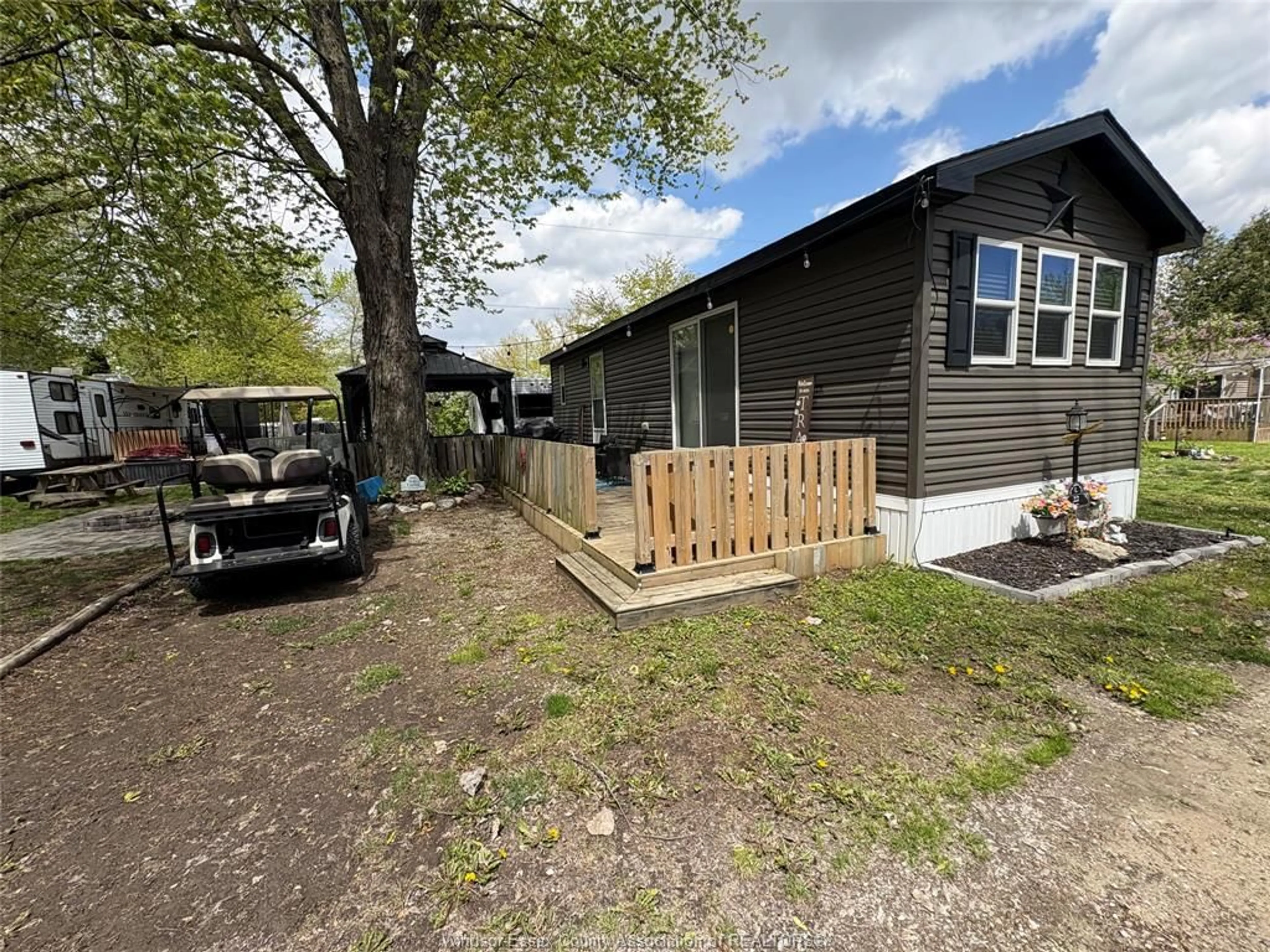 A pic from outside/outdoor area/front of a property/back of a property/a pic from drone, street for 22 POPLAR Lane, Leamington Ontario N0P 2G0