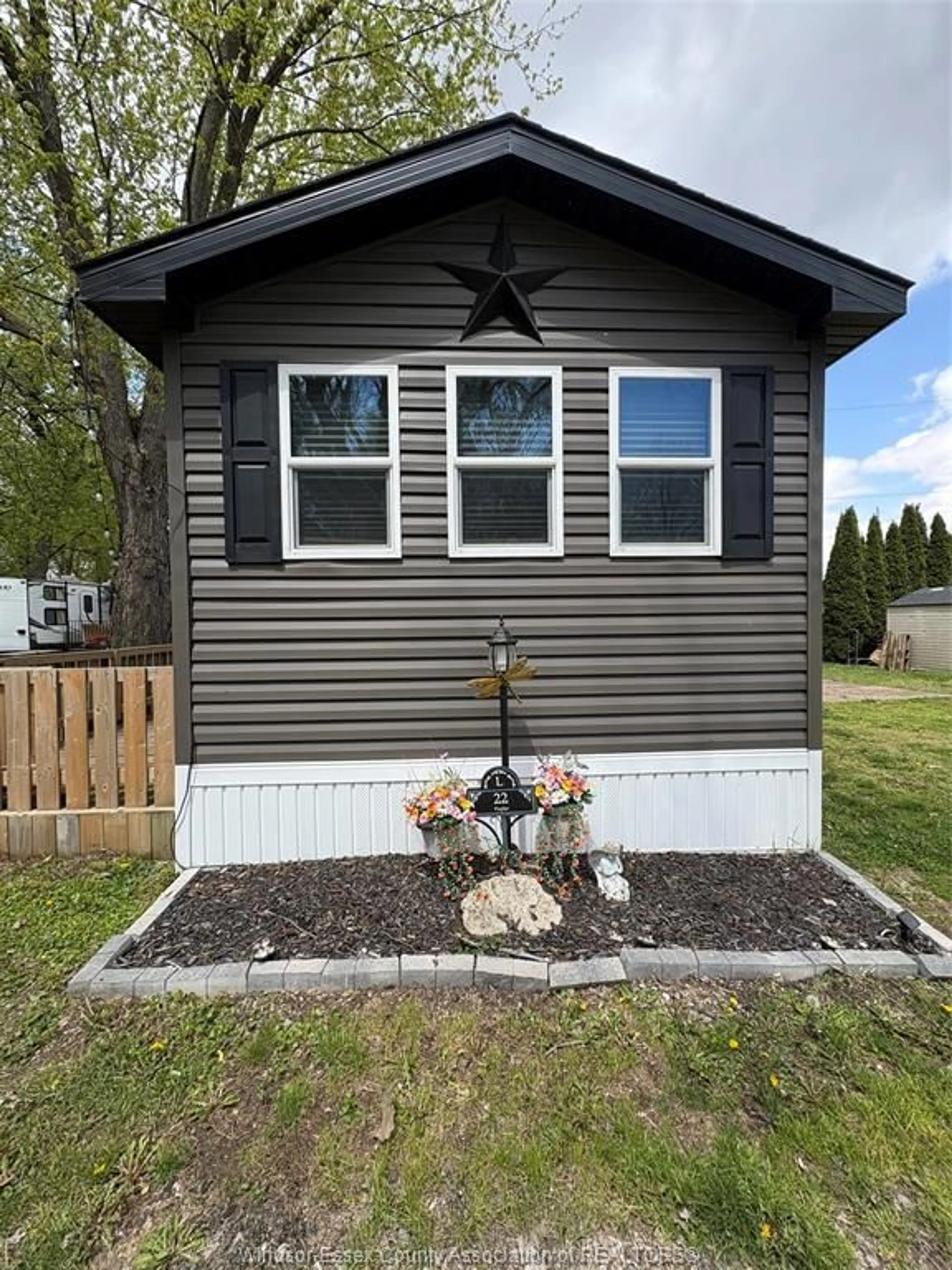 Home with vinyl exterior material, street for 22 POPLAR Lane, Leamington Ontario N0P 2G0