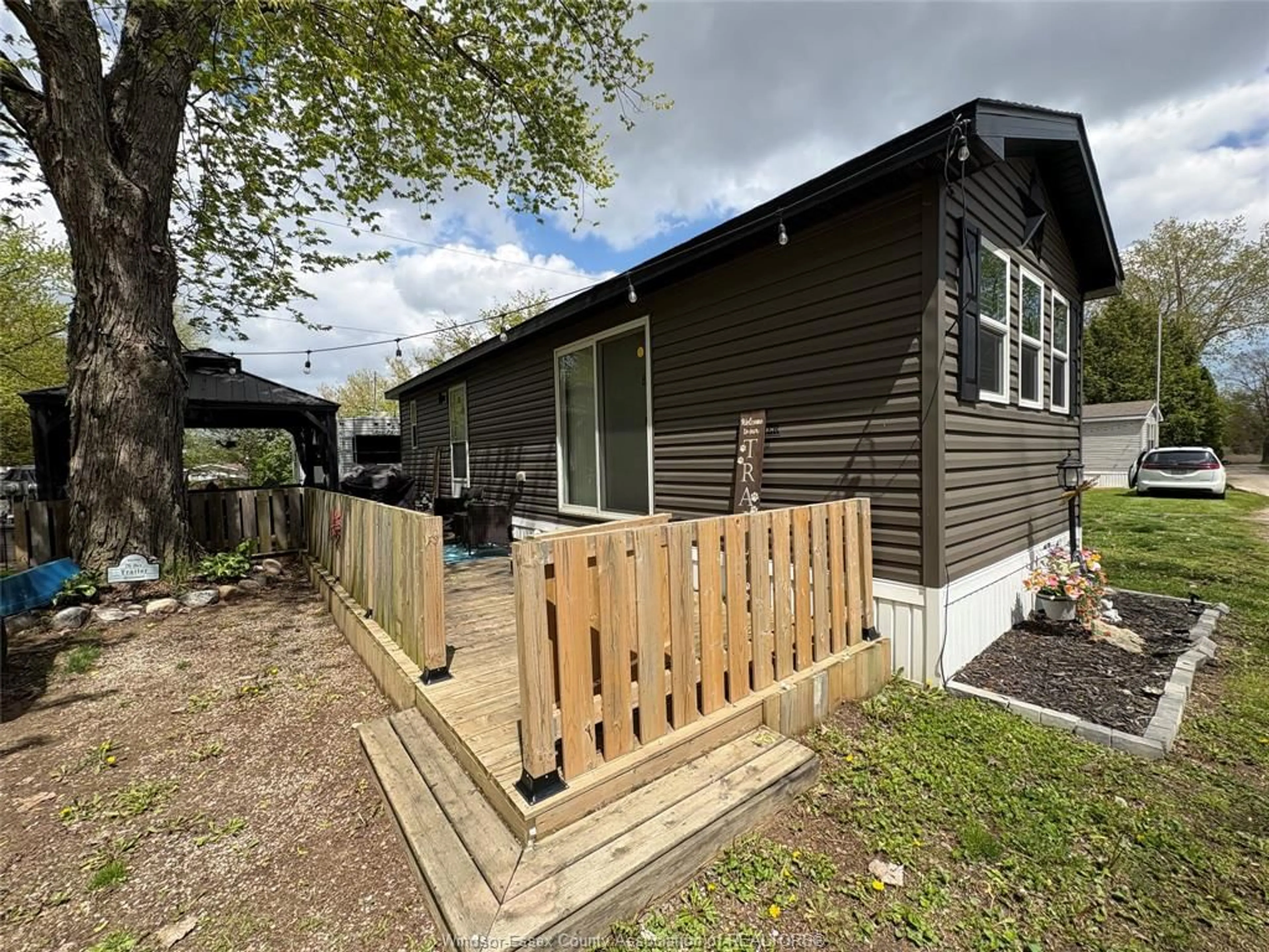 A pic from outside/outdoor area/front of a property/back of a property/a pic from drone, street for 22 POPLAR Lane, Leamington Ontario N0P 2G0