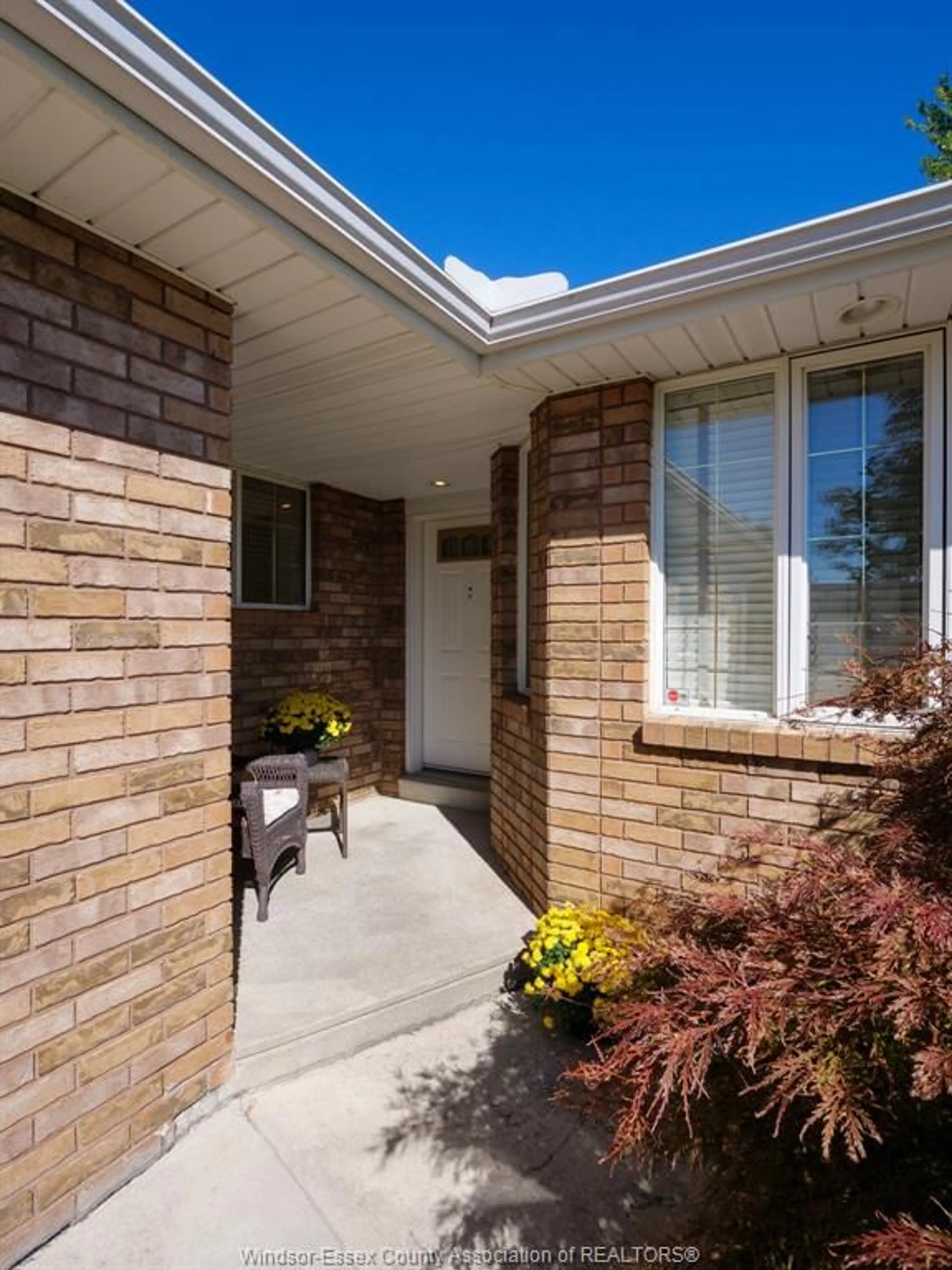 Home with brick exterior material, street for 1592 BLUE HERON Dr, Windsor Ontario N8P 1L6