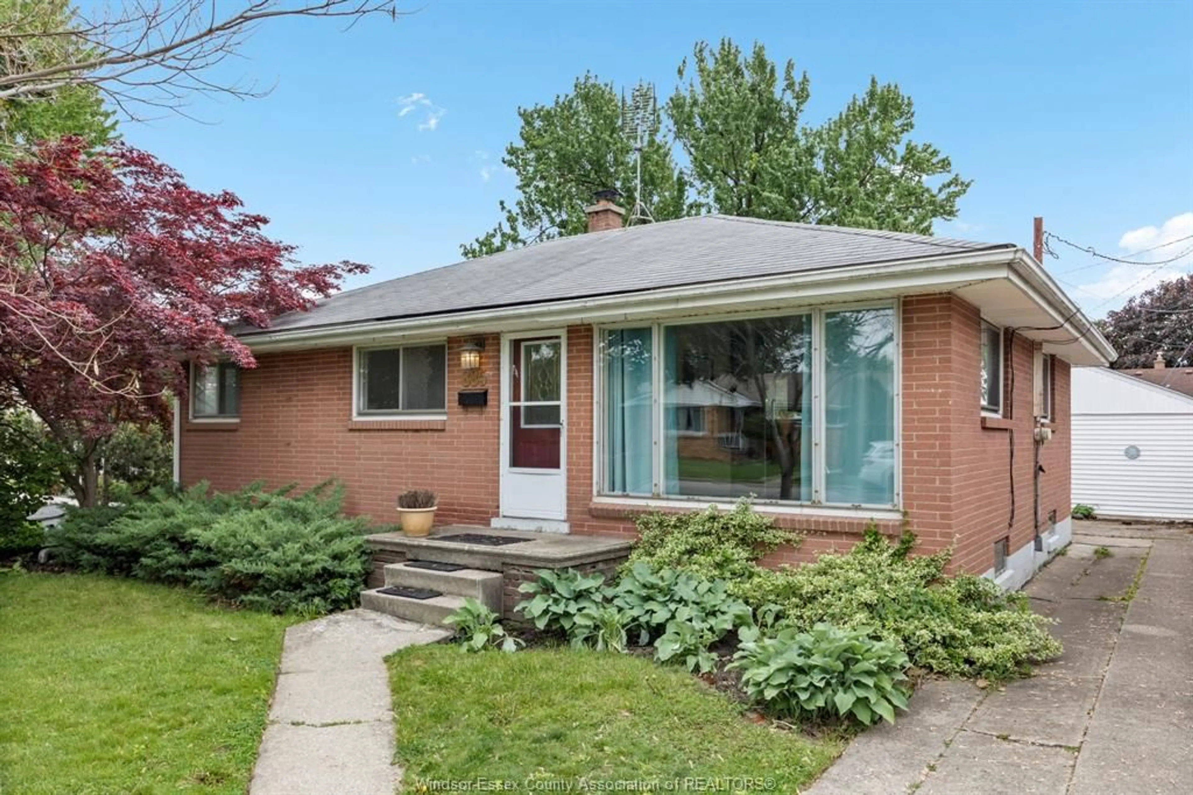 Home with brick exterior material, street for 885 ISACK Dr, Windsor Ontario N8S 3W6