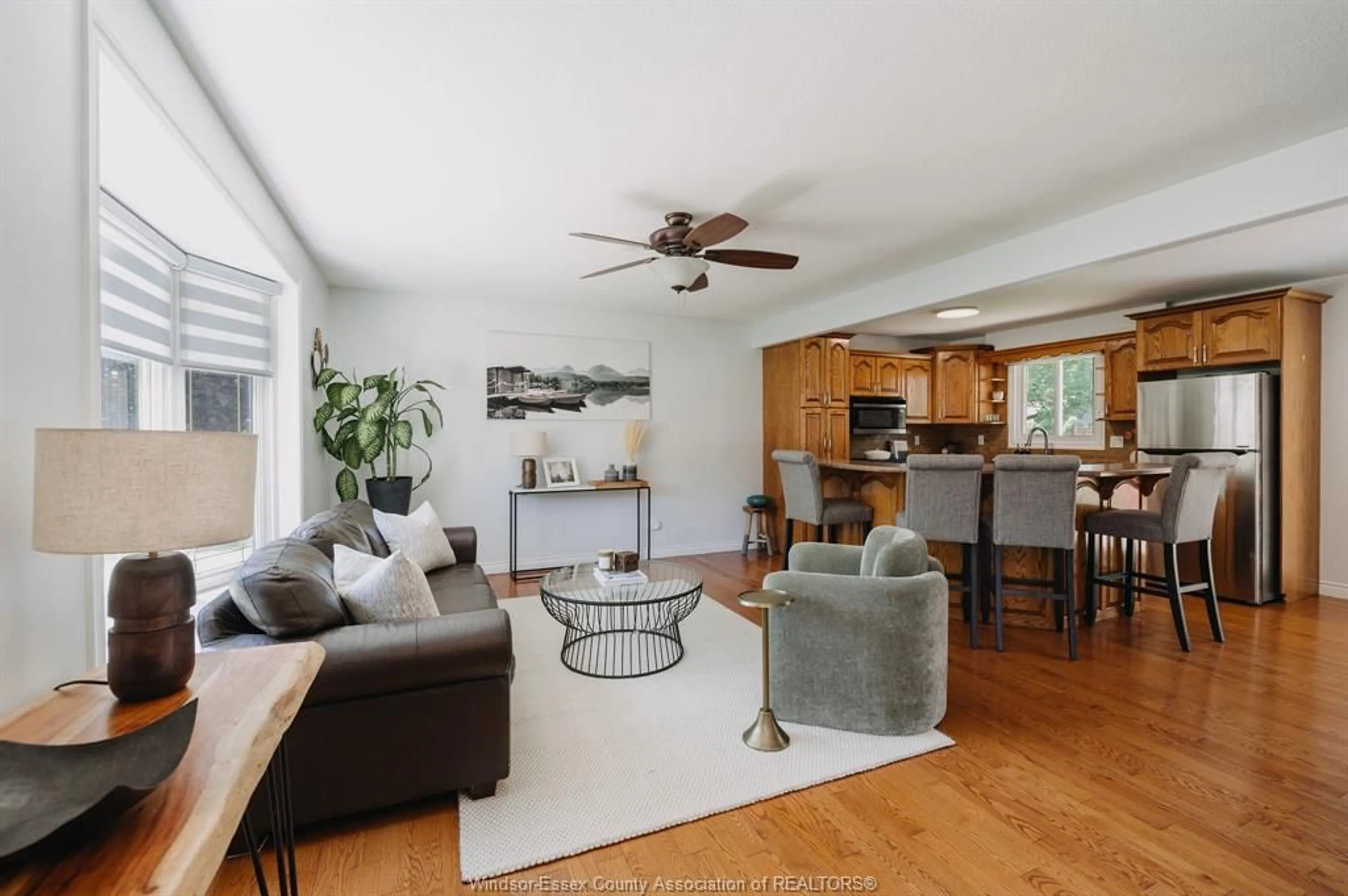 Living room with furniture, wood/laminate floor for 247 Pacific Ave, Amherstburg Ontario N9V 3E5