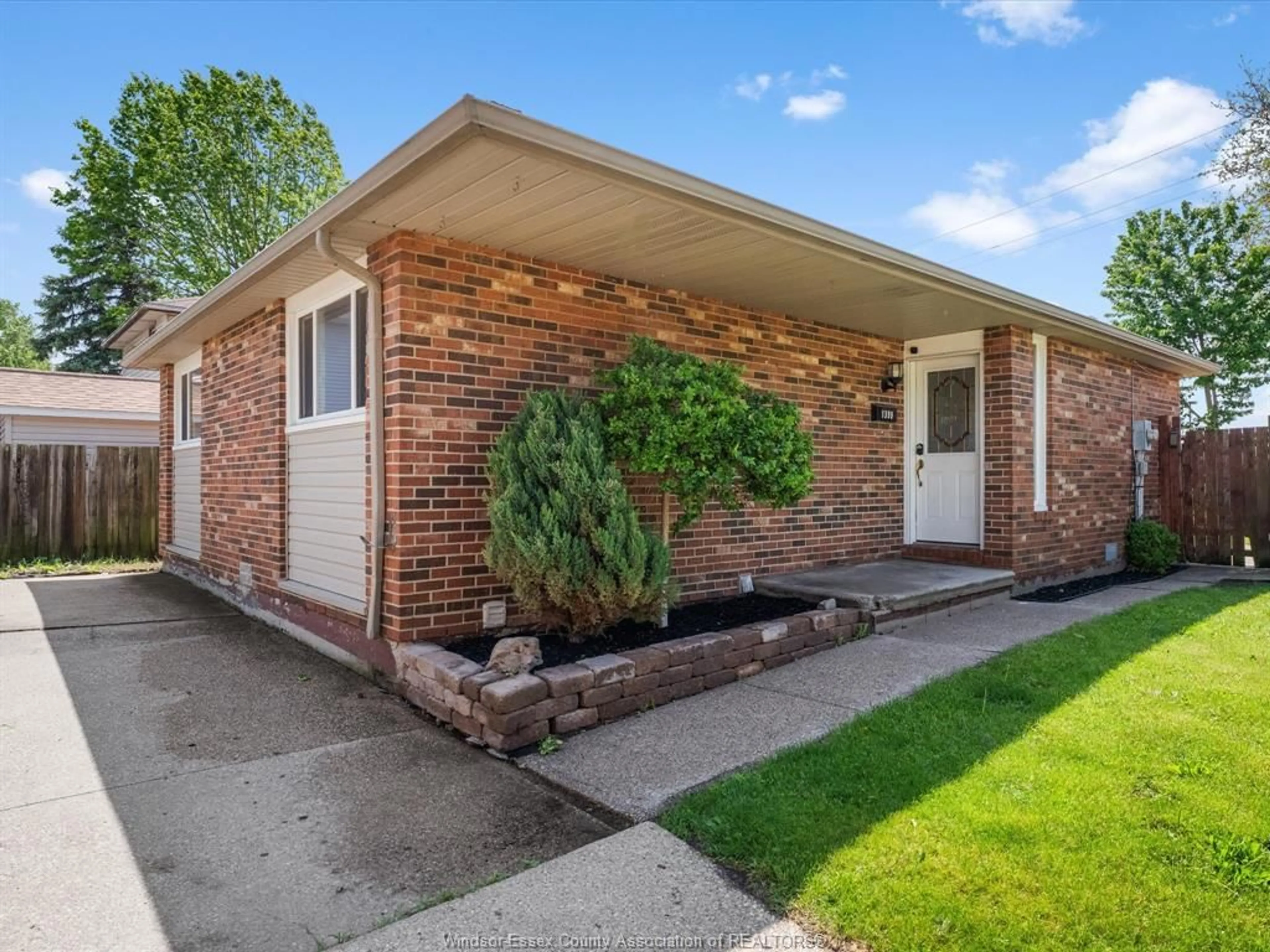 Home with brick exterior material, street for 1399 COPPERFIELD Pl, Windsor Ontario N9S 4G8