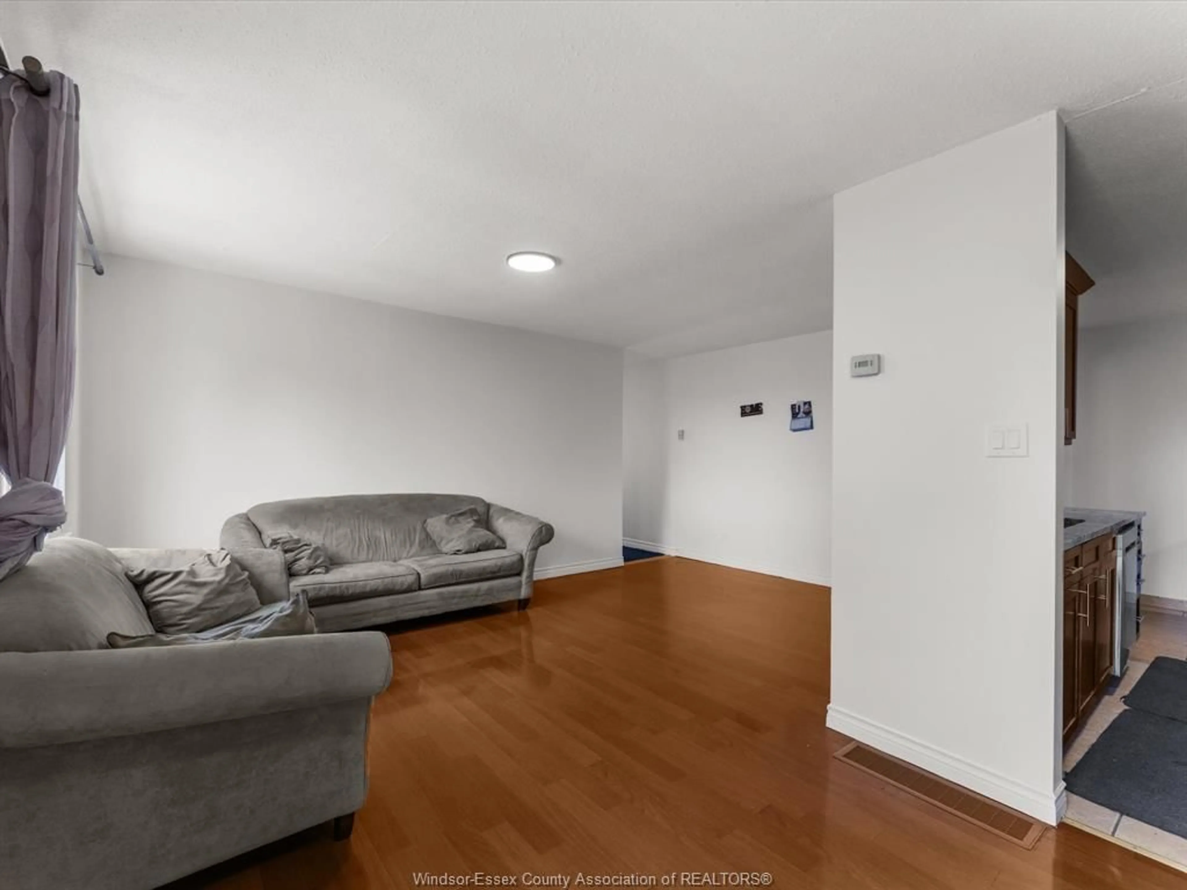 Living room with furniture, unknown for 1399 COPPERFIELD Pl, Windsor Ontario N9S 4G8