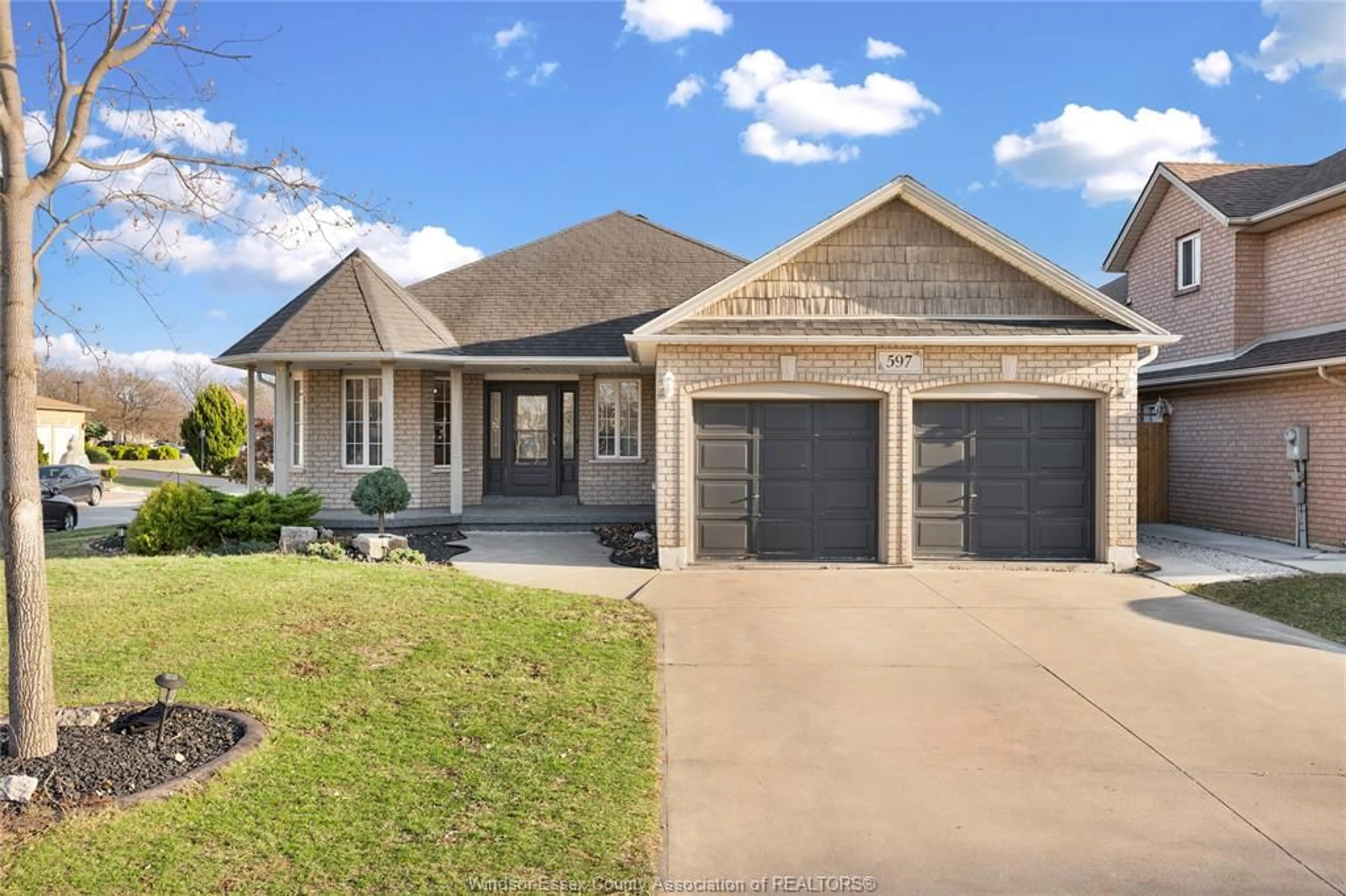 Home with brick exterior material, street for 597 COMPTON, Windsor Ontario N9E 4P7