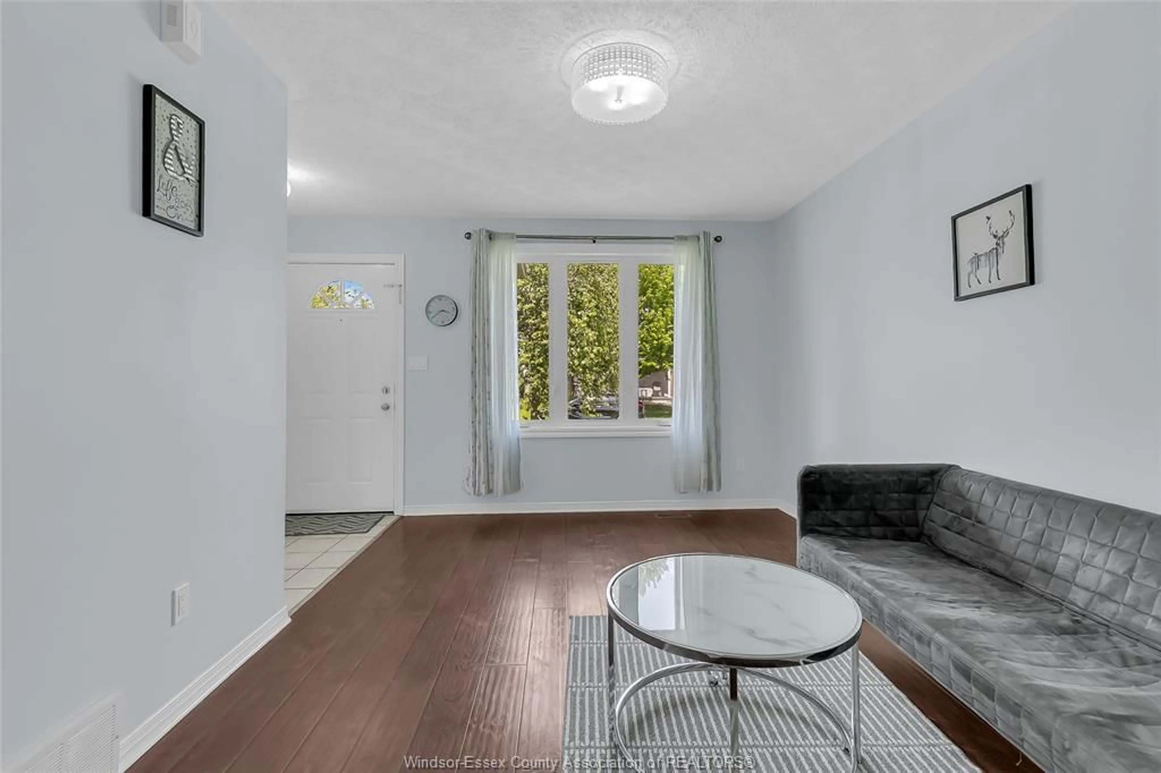 Living room with furniture, floor is not visible for 3453 CARIBOU Cres, Windsor Ontario N8W 5V4