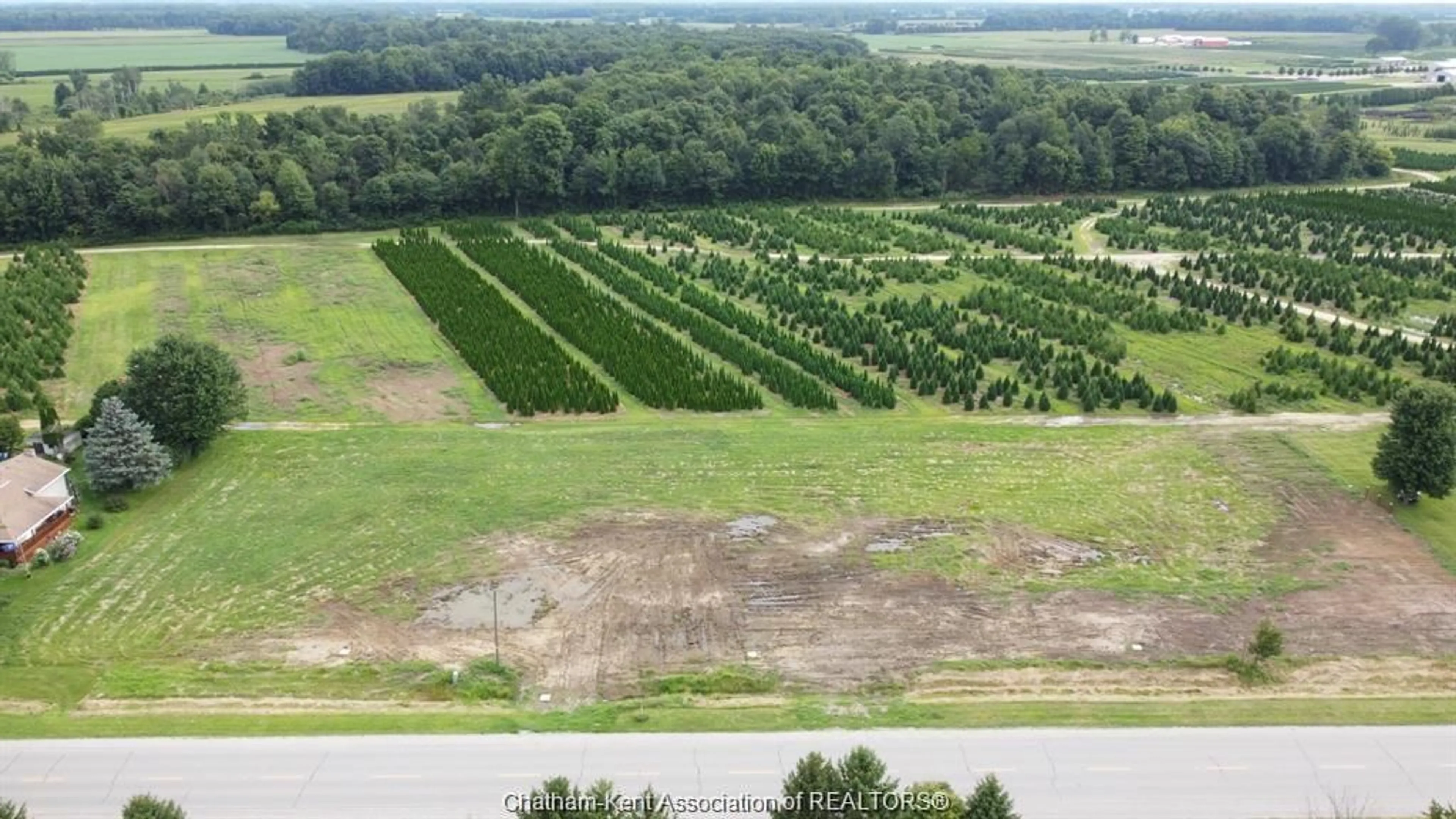 A pic from outside/outdoor area/front of a property/back of a property/a pic from drone, forest/trees view for 15013 MAIN Line, Bothwell Ontario N0P 1C0