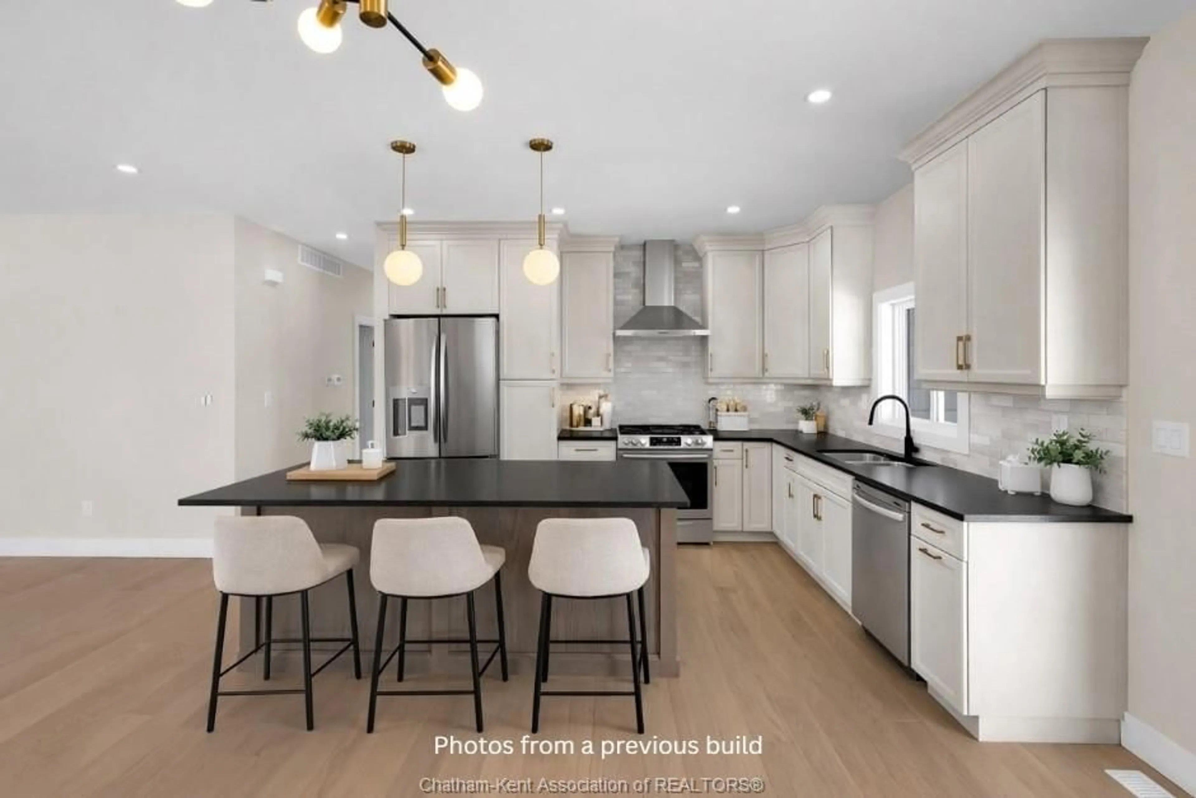 Open concept kitchen, ceramic/tile floor for 75 Cherry Blossom Trail, Chatham Ontario N7L 0H3